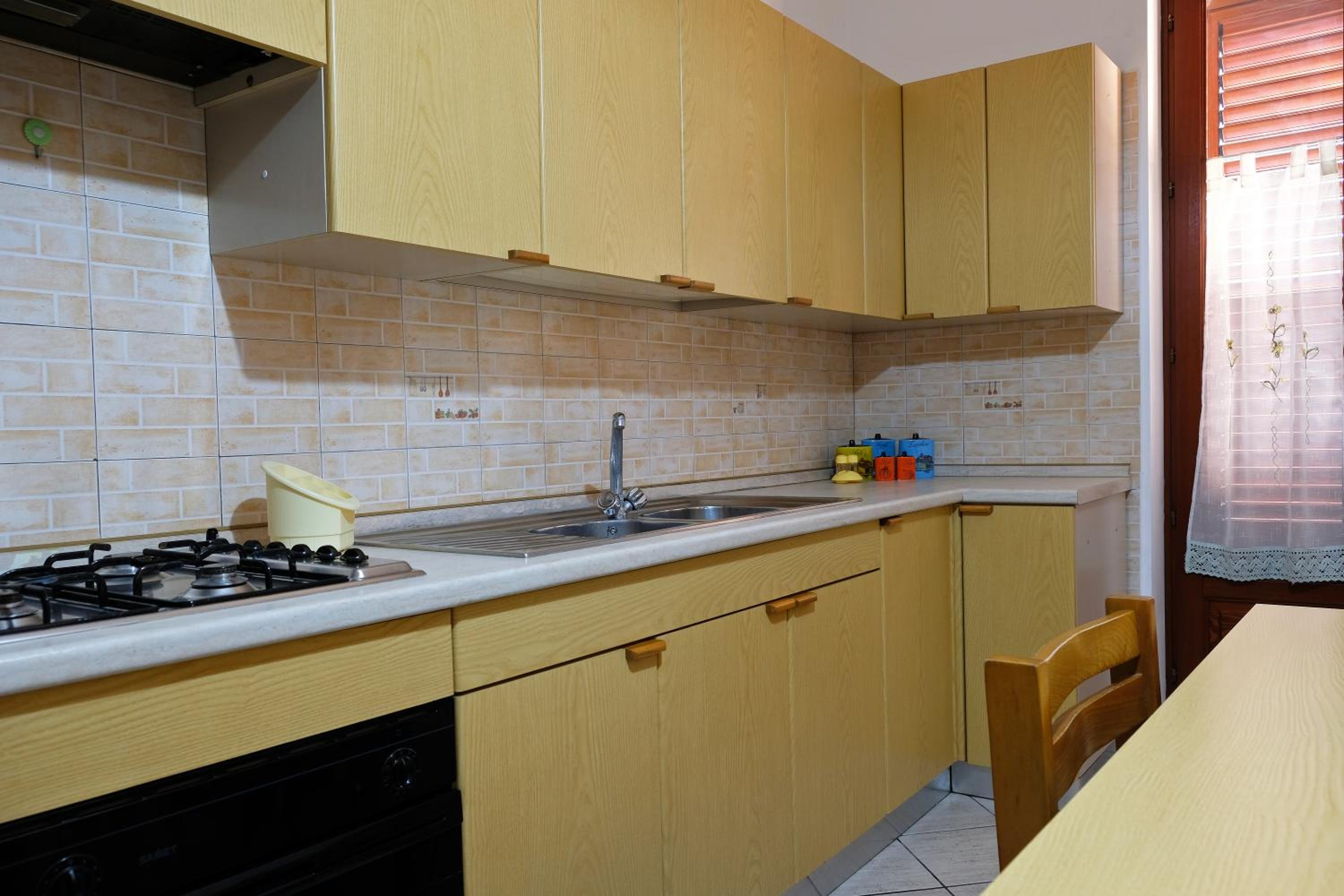 Four-Bedroom Apartment - Photo 24