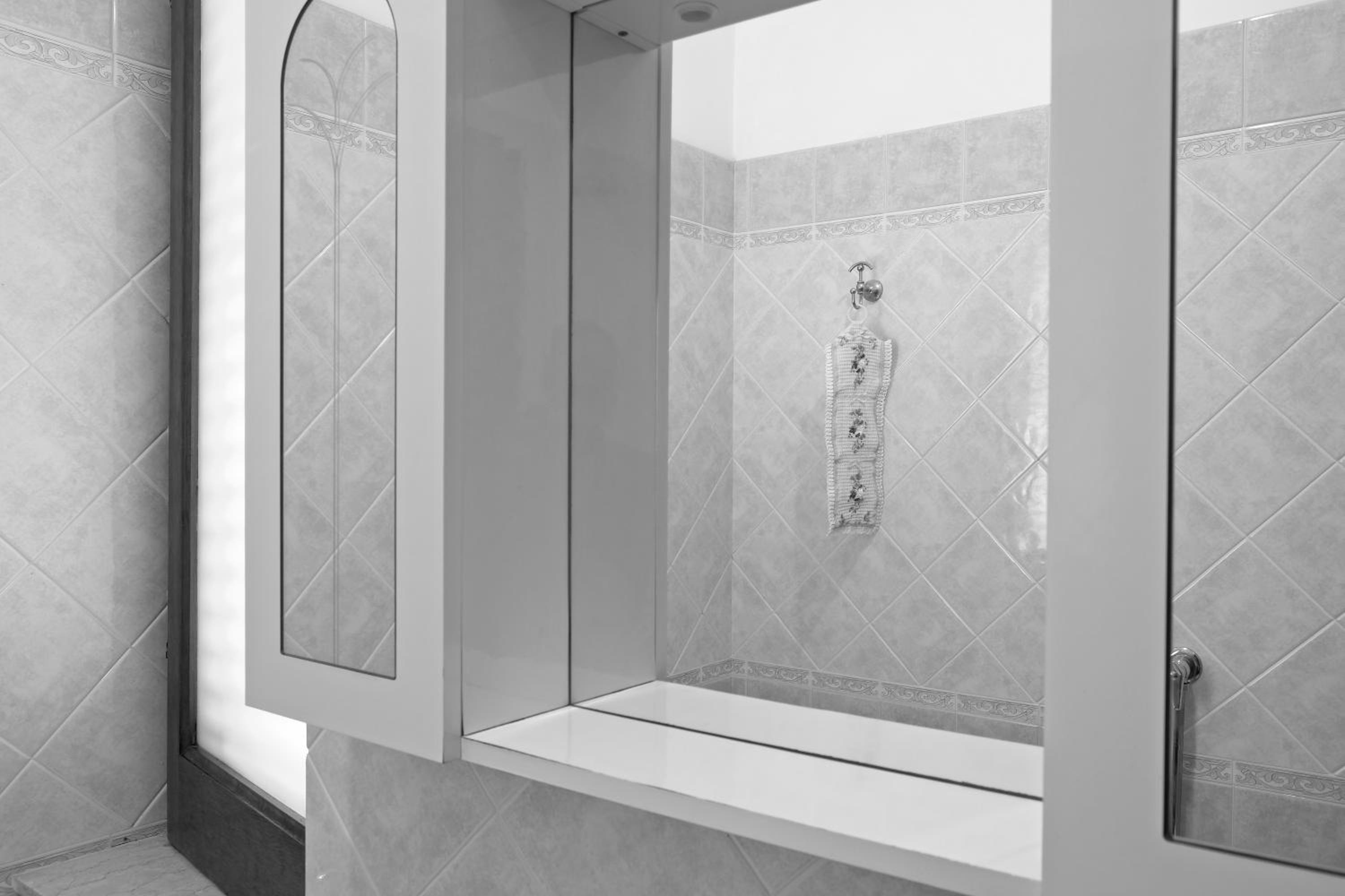 Four-Bedroom Apartment - Photo 23