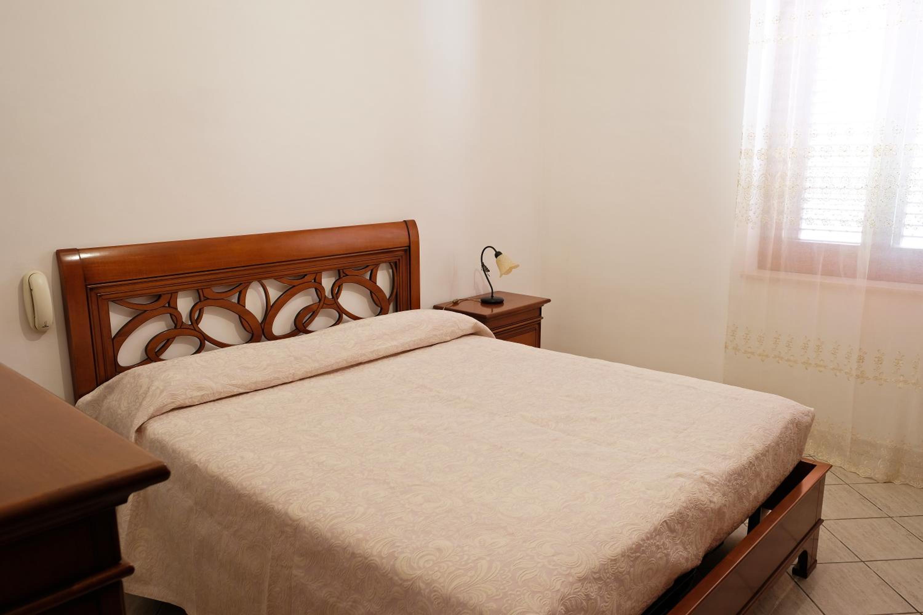 Four-Bedroom Apartment - Photo 16