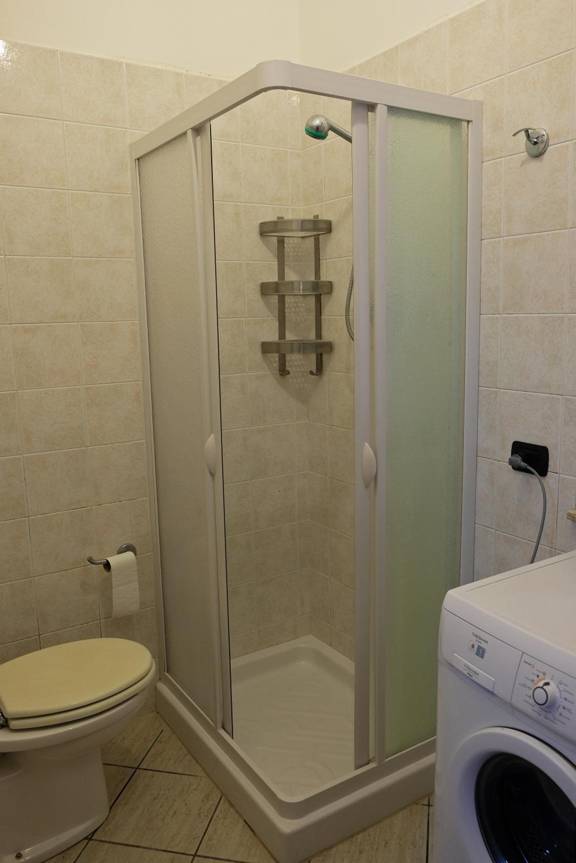 Four-Bedroom Apartment - Photo 13