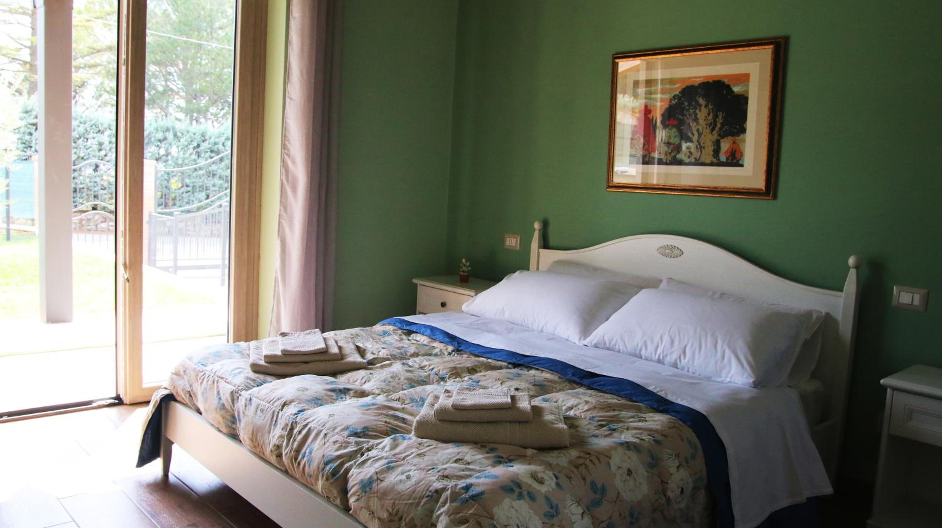 Deluxe Double Room with Extra Bed - Photo 1