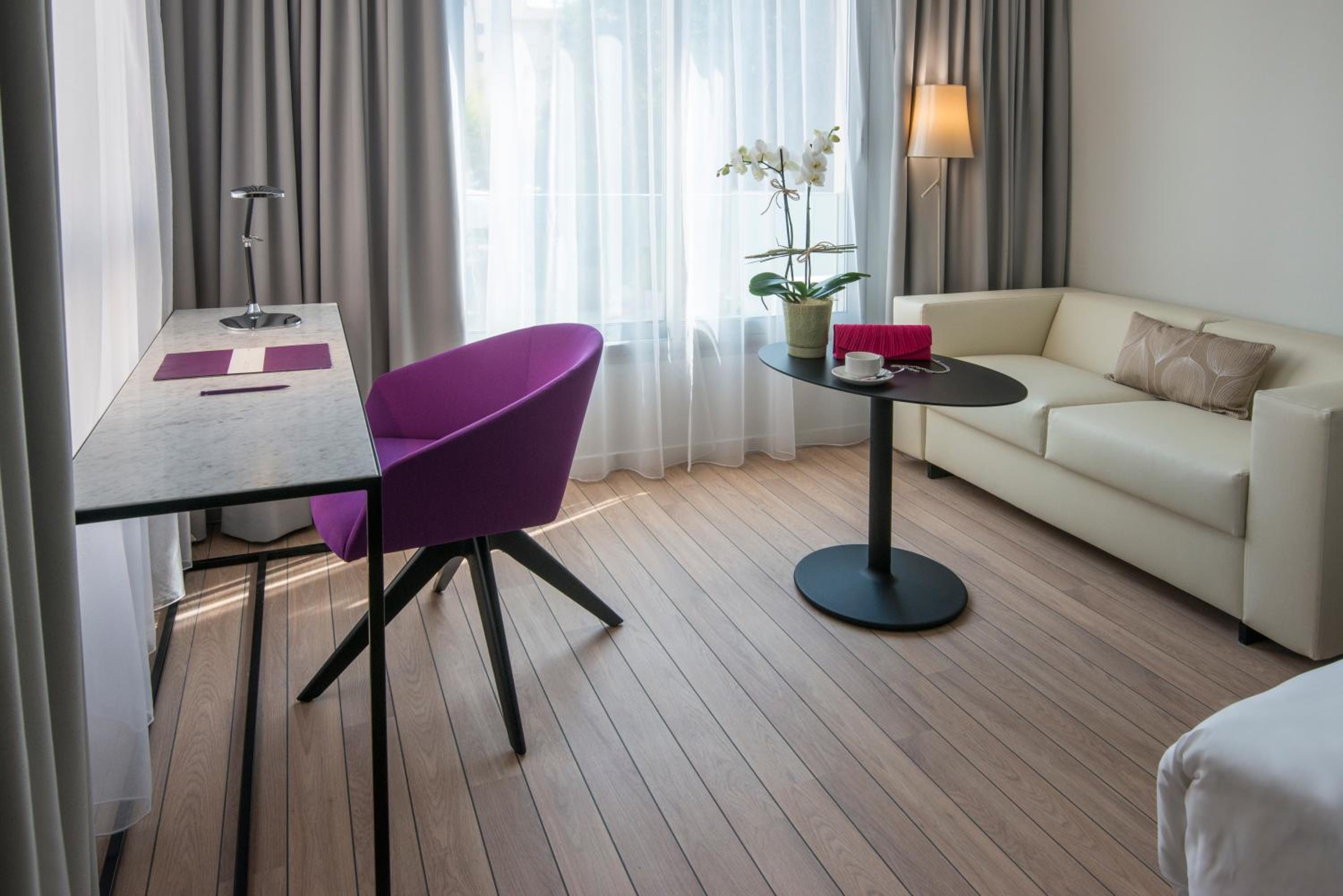 Privilege Room with One Queen Bed and 1 Sofa Bed - Photo 1