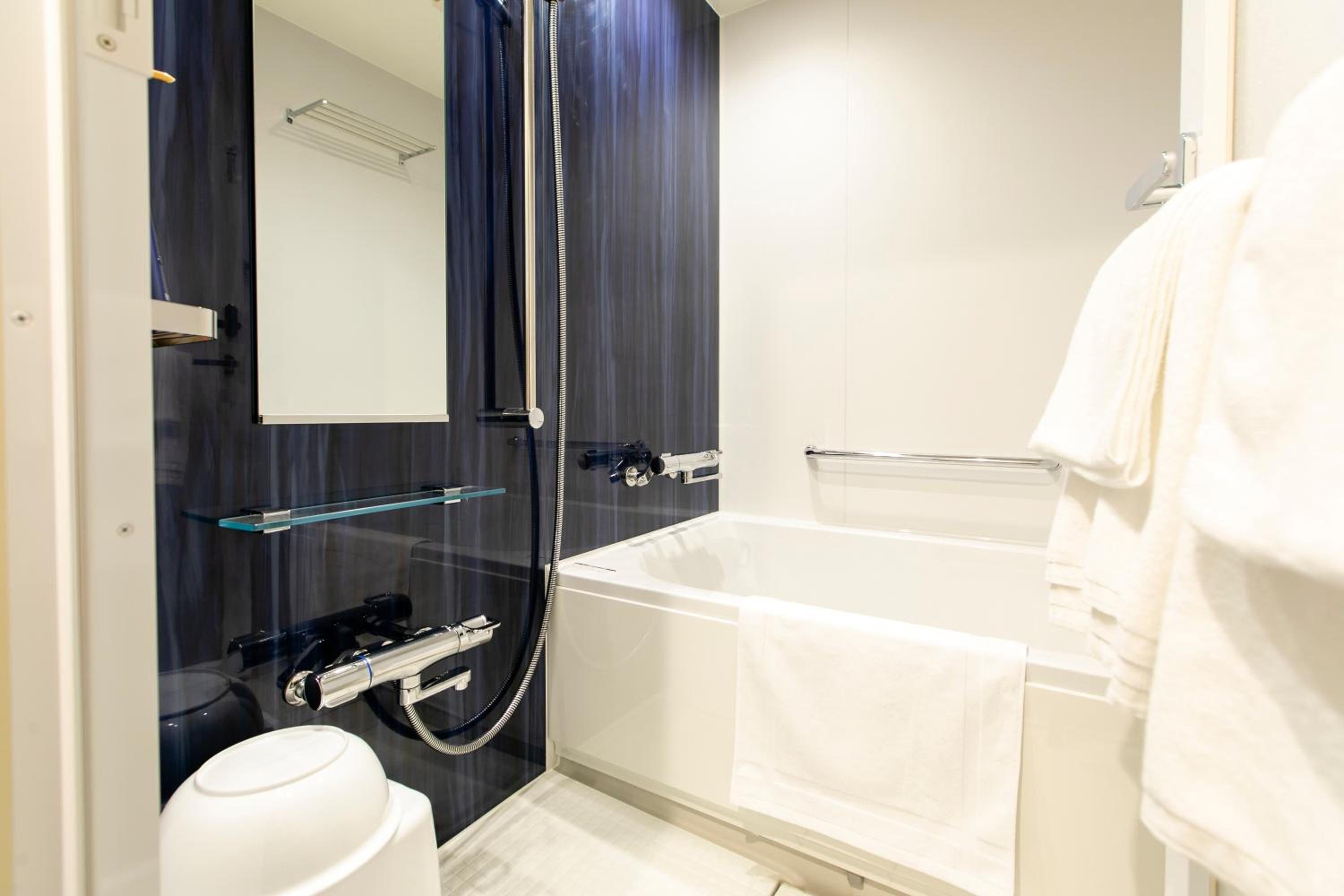 Standard Twin Room - Photo 9