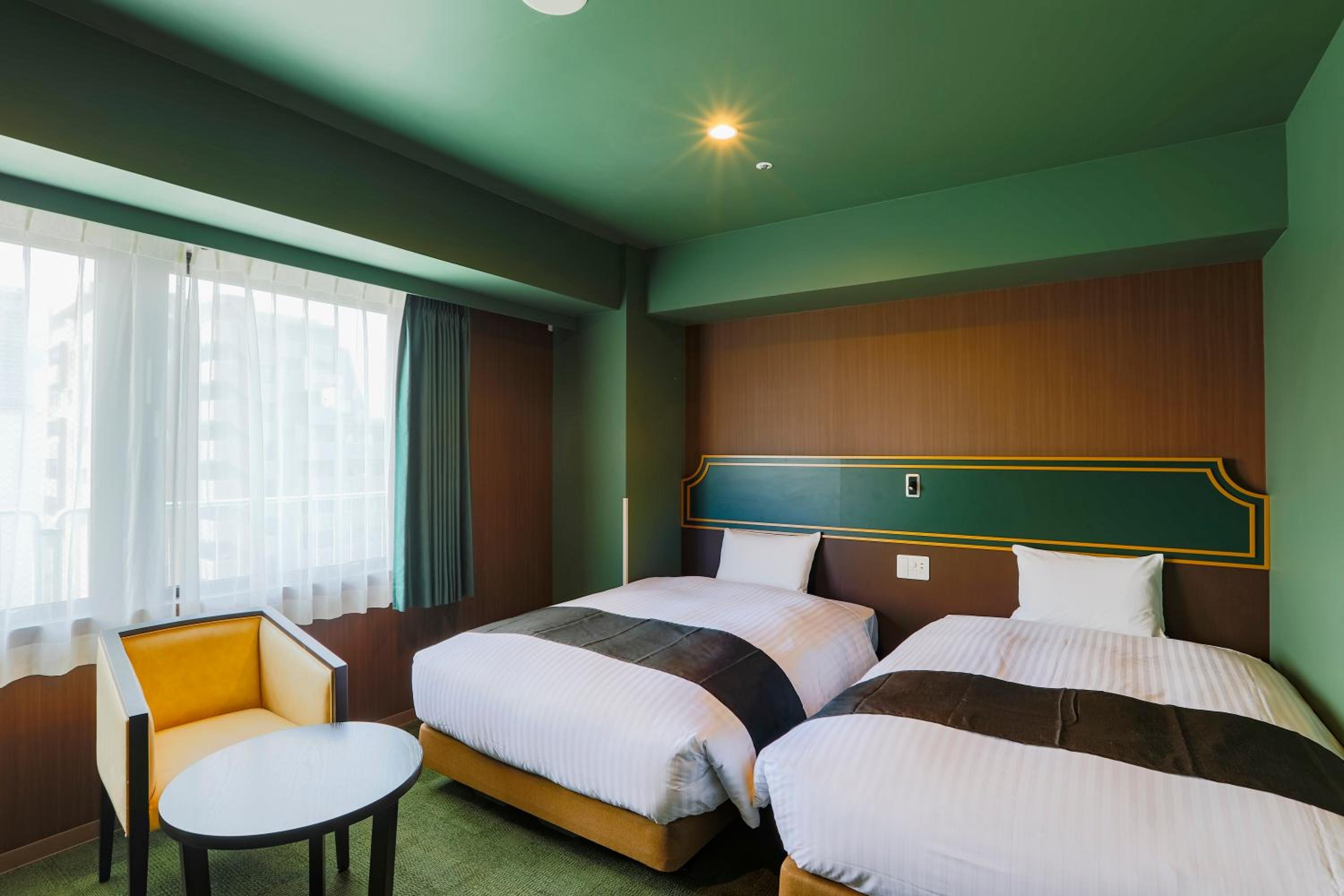 Deluxe Twin Room - Photo 12