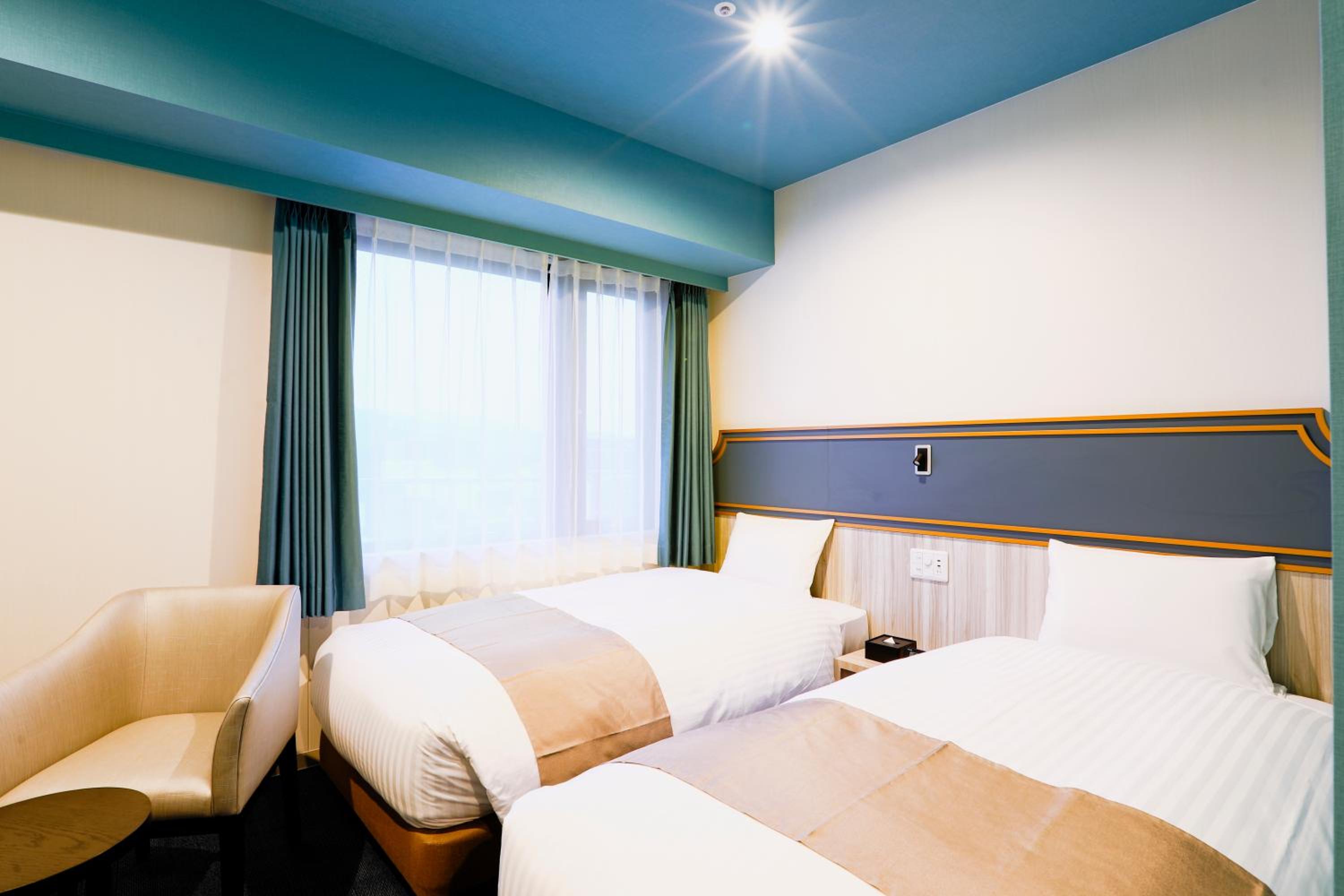 Standard Twin Room - Photo 17