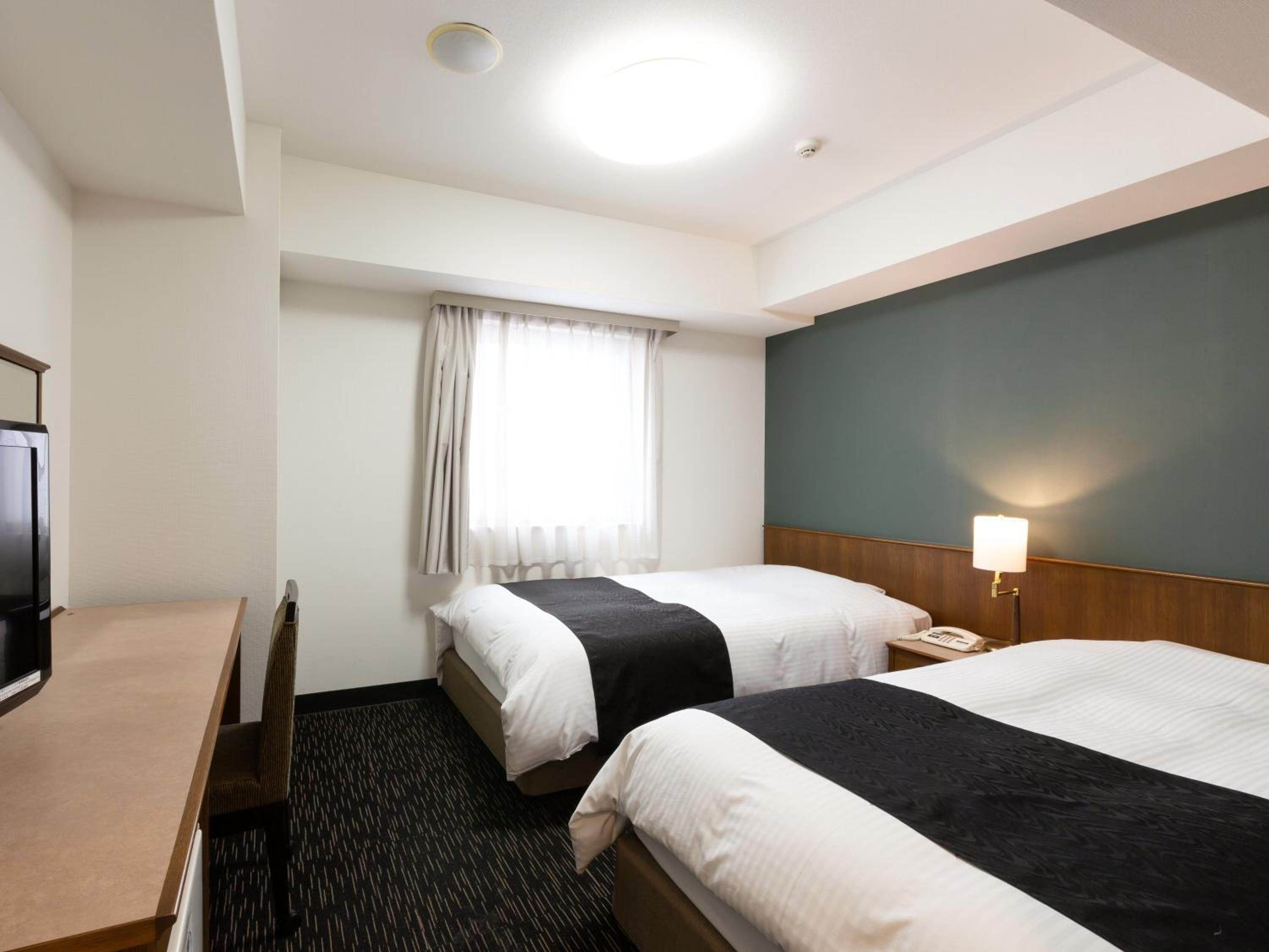 Twin Room - Non-Smoking - Photo 1