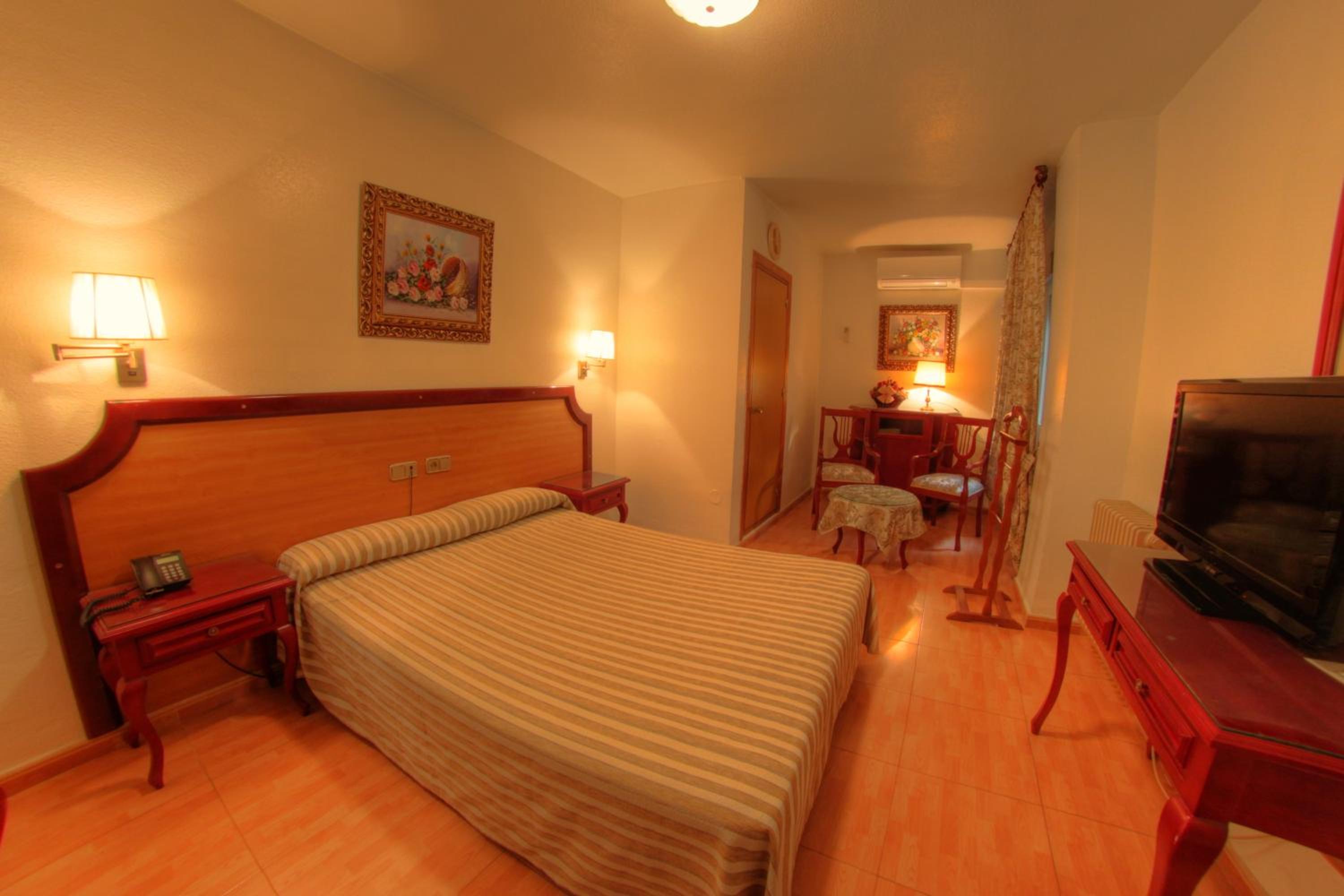 Habitación Estándar con Cama Queen