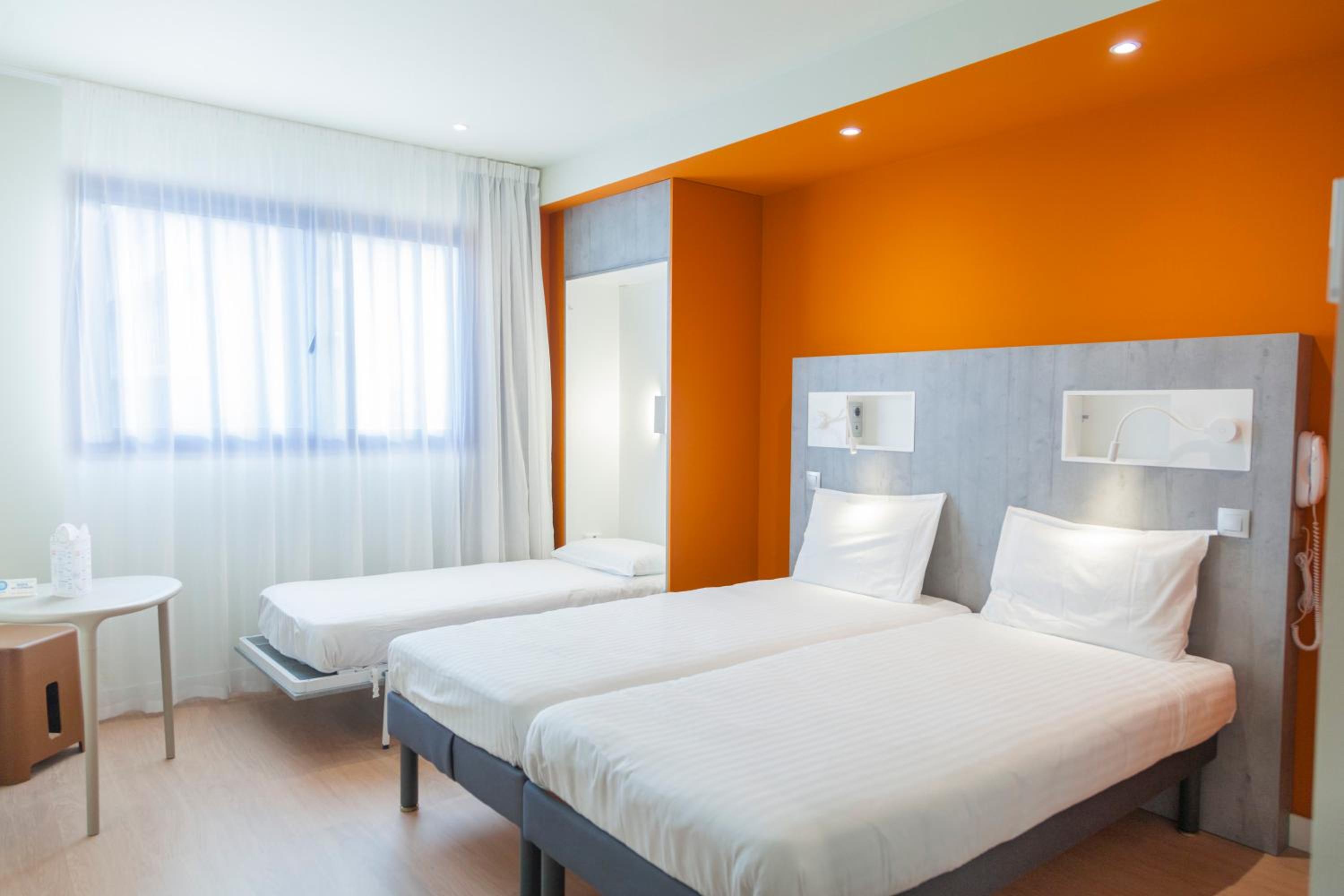 Habitación Estándar con Tres Camas Individuales