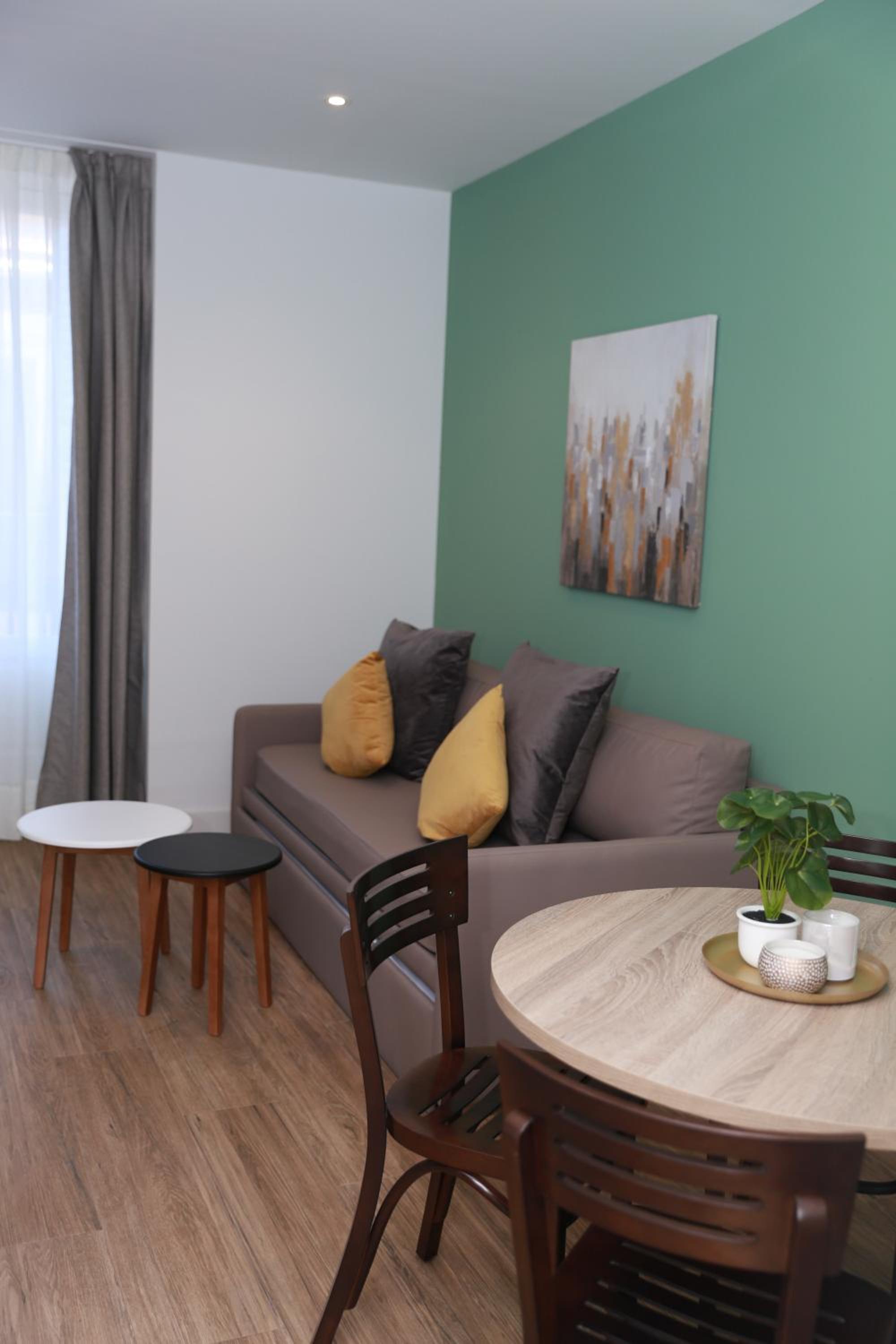 Apartment with Balcony - Photo 1