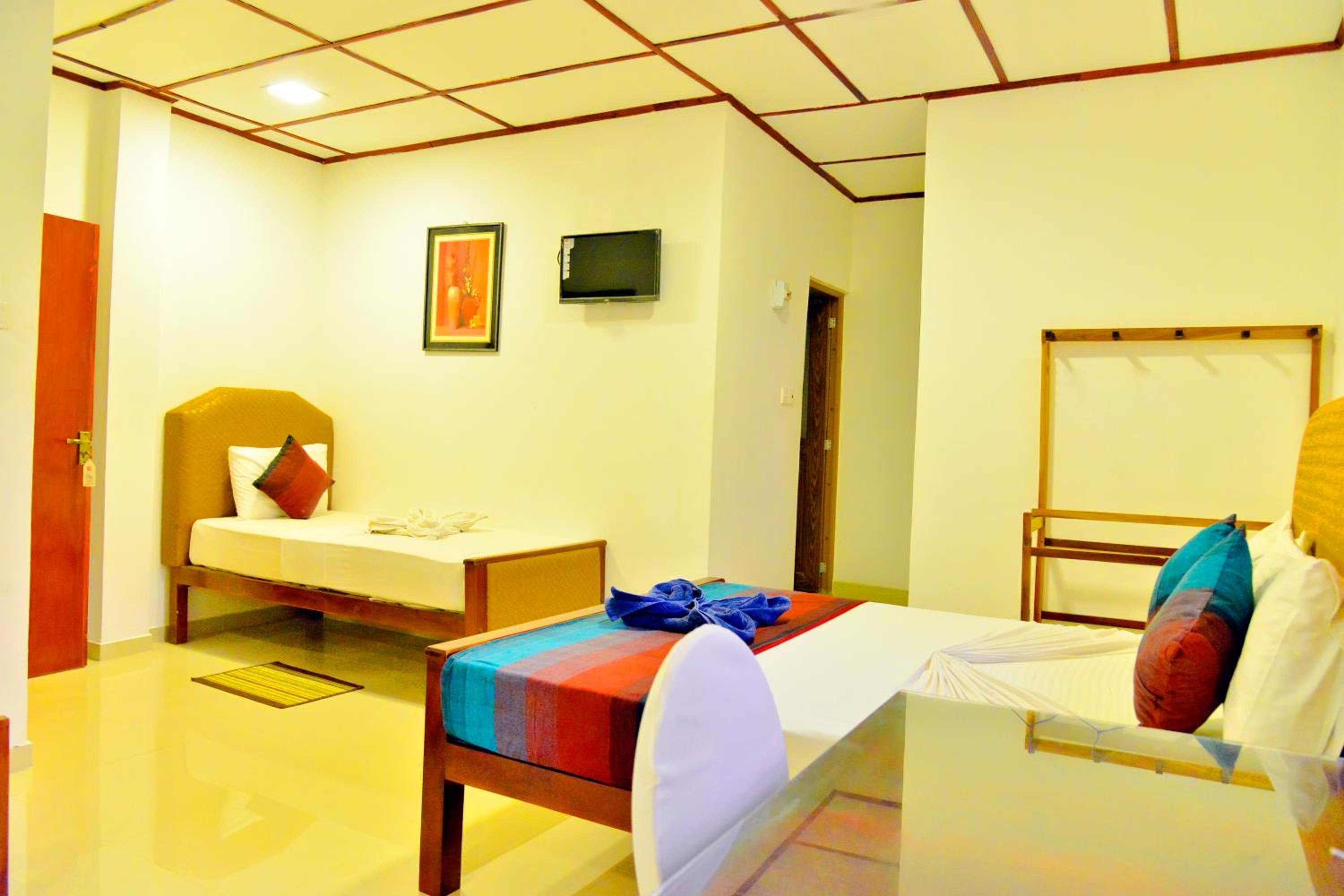 Deluxe Triple Room