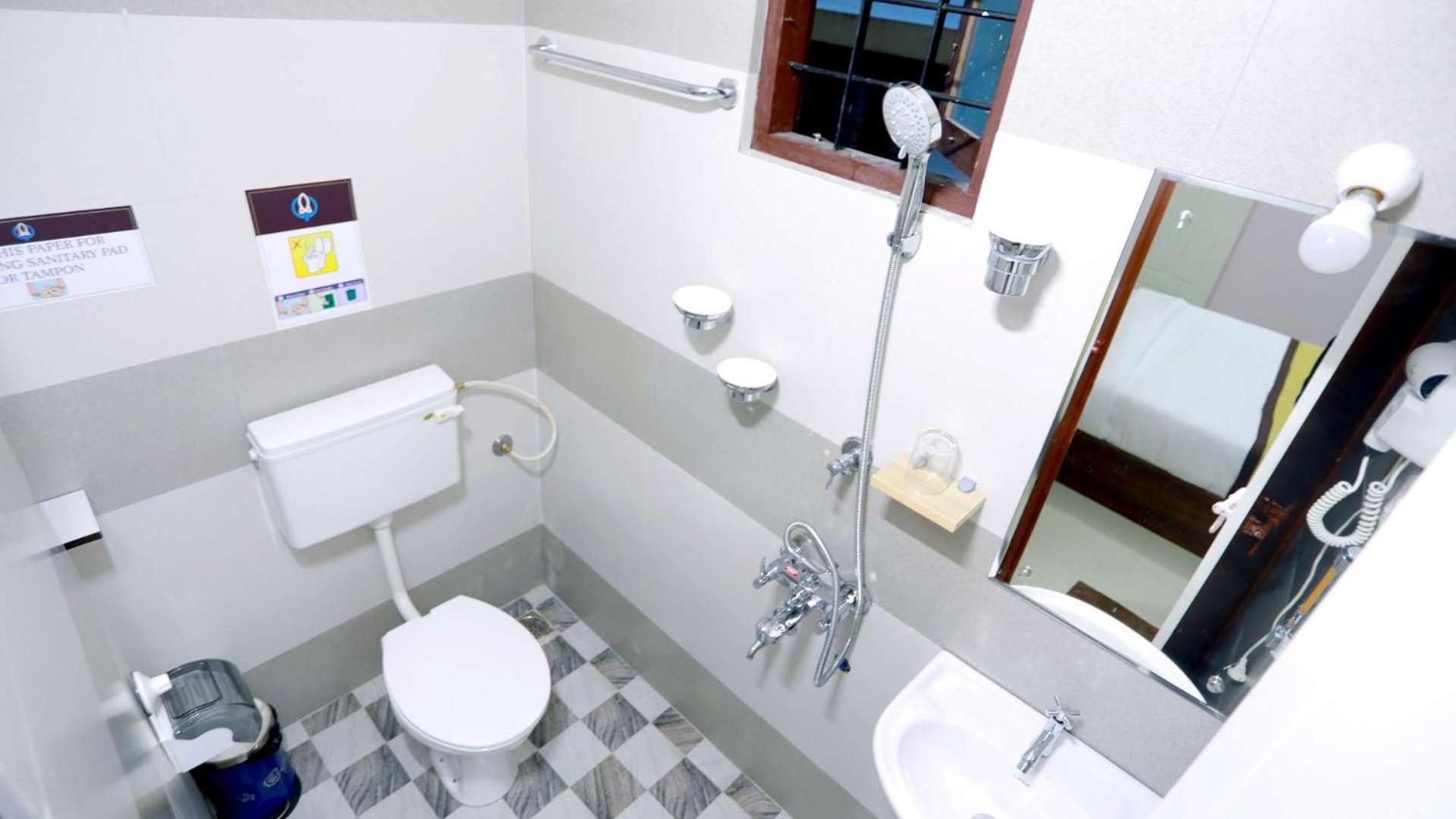Deluxe Triple Room - Photo 12