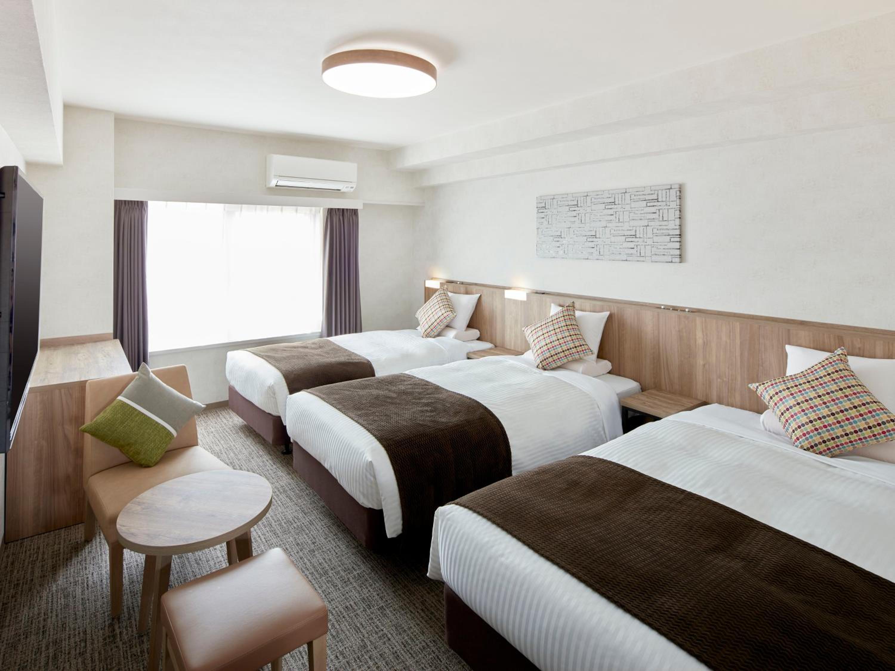 Standard Triple Room - Non-Smoking - House Keeping is Optional with Additional Cost photo 1
