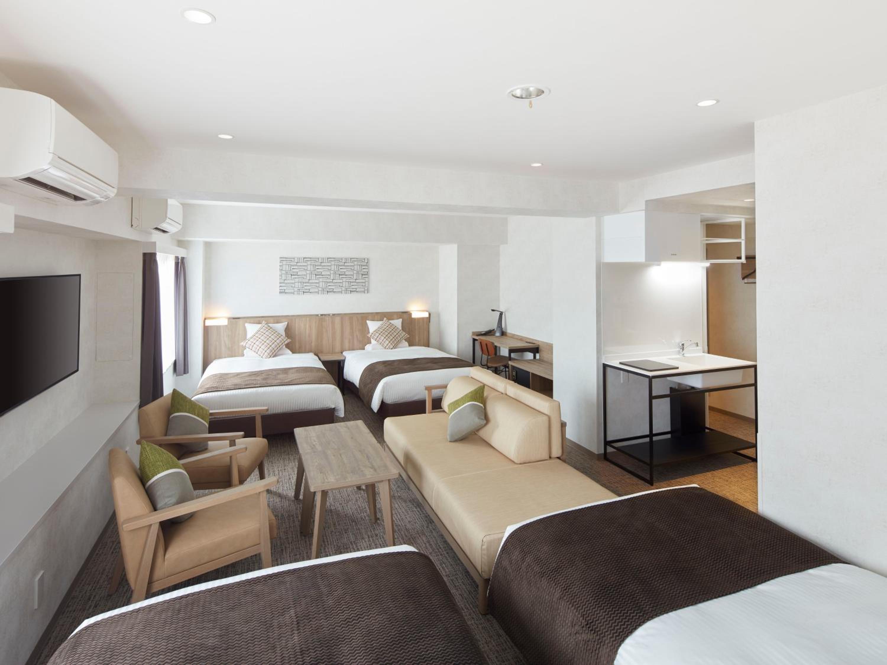 Deluxe Family Room with Kitchen - Non-Smoking - House Keeping is Optional with Additional Cost photo 1