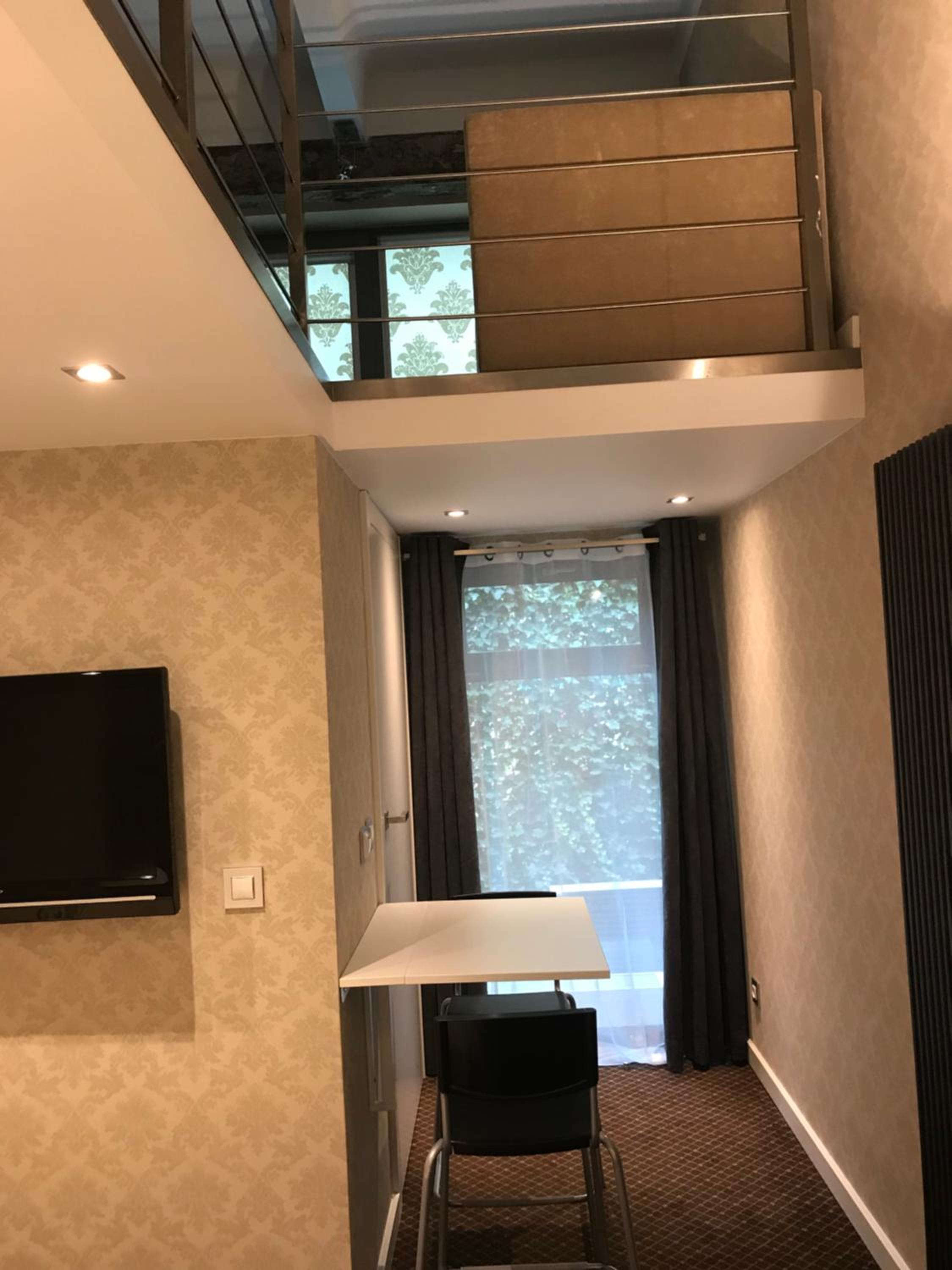 Deluxe Junior Suite - Photo 16