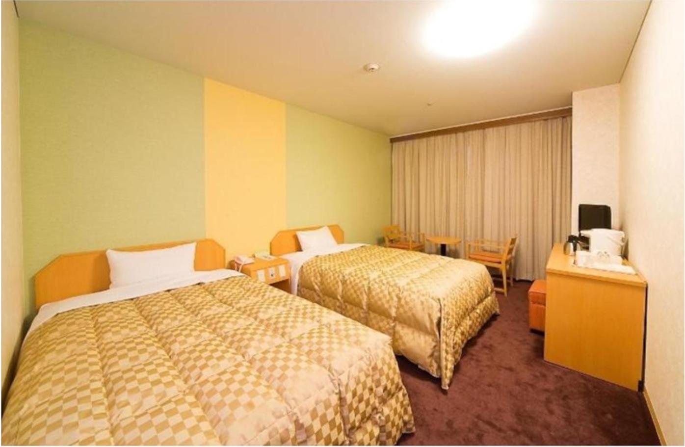 Twin Room - Non-Smoking - Photo 1