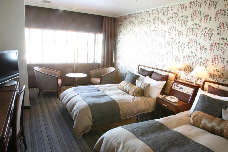 Twin Room - Photo 5