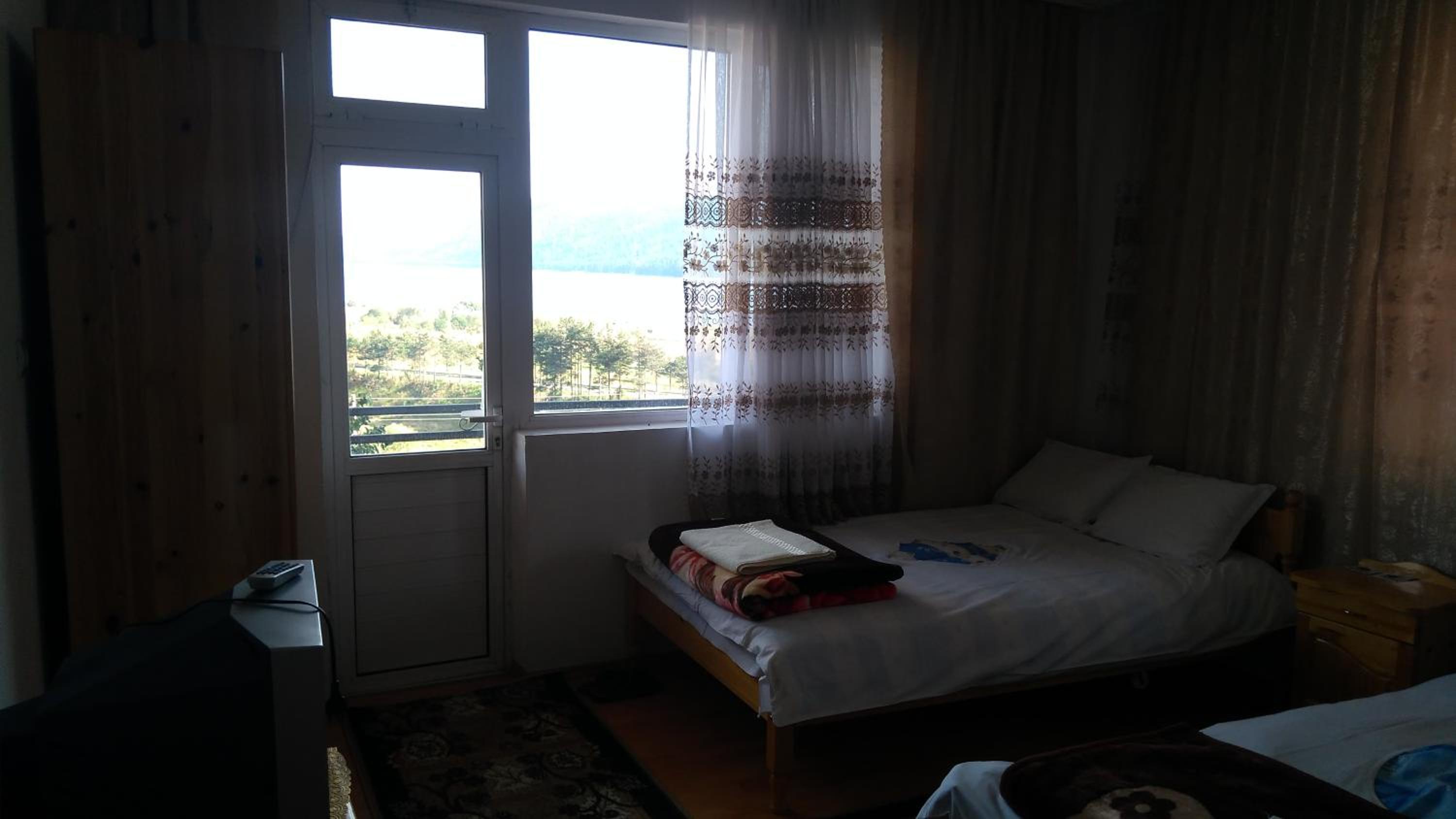 Basic Triple Room with Shared Bathroom photo 3