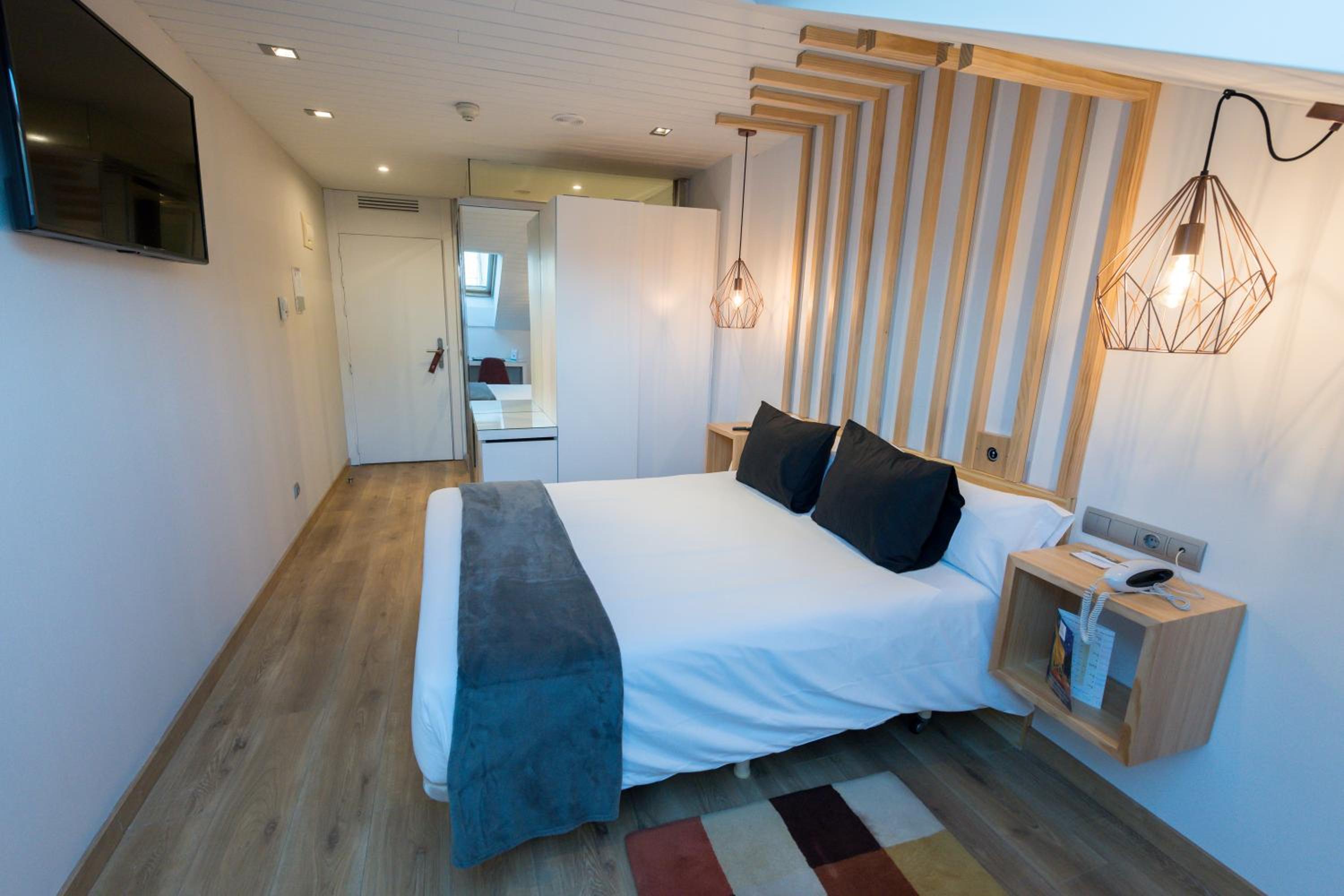 Habitación Doble con Sofá Cama