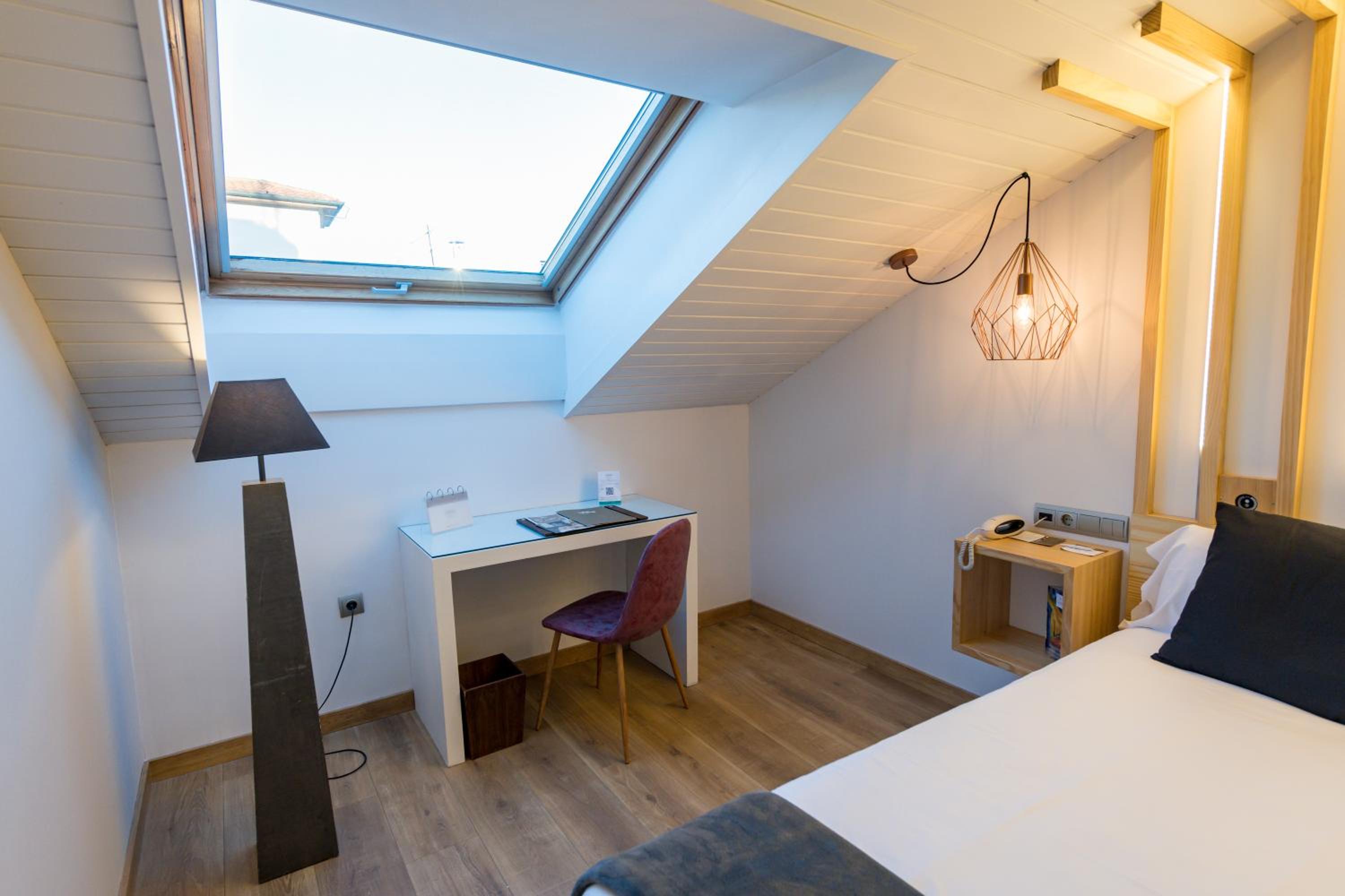 Habitación Doble con Sofá Cama