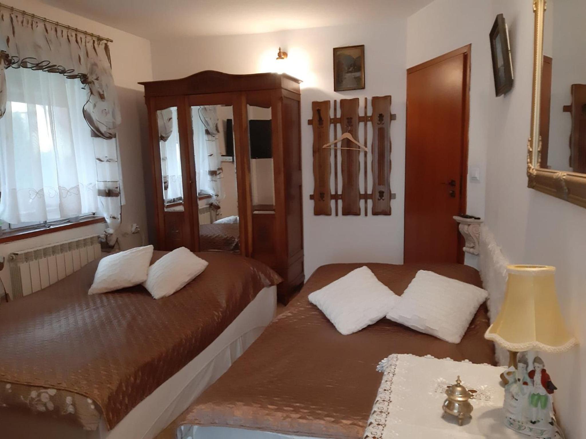 Family Room with Private Bathroom, Balcony and Mountain View photo 1