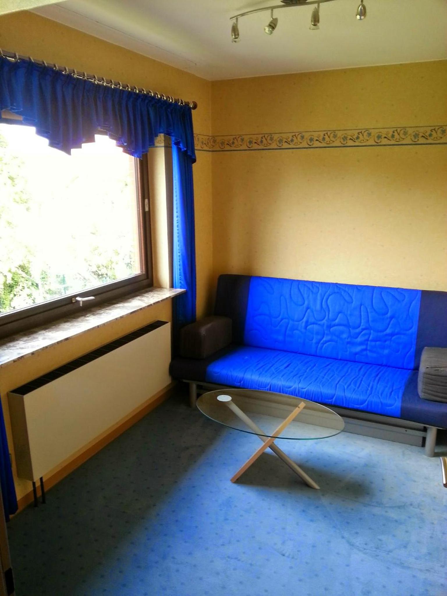 Three-Bedroom Apartment photo 1