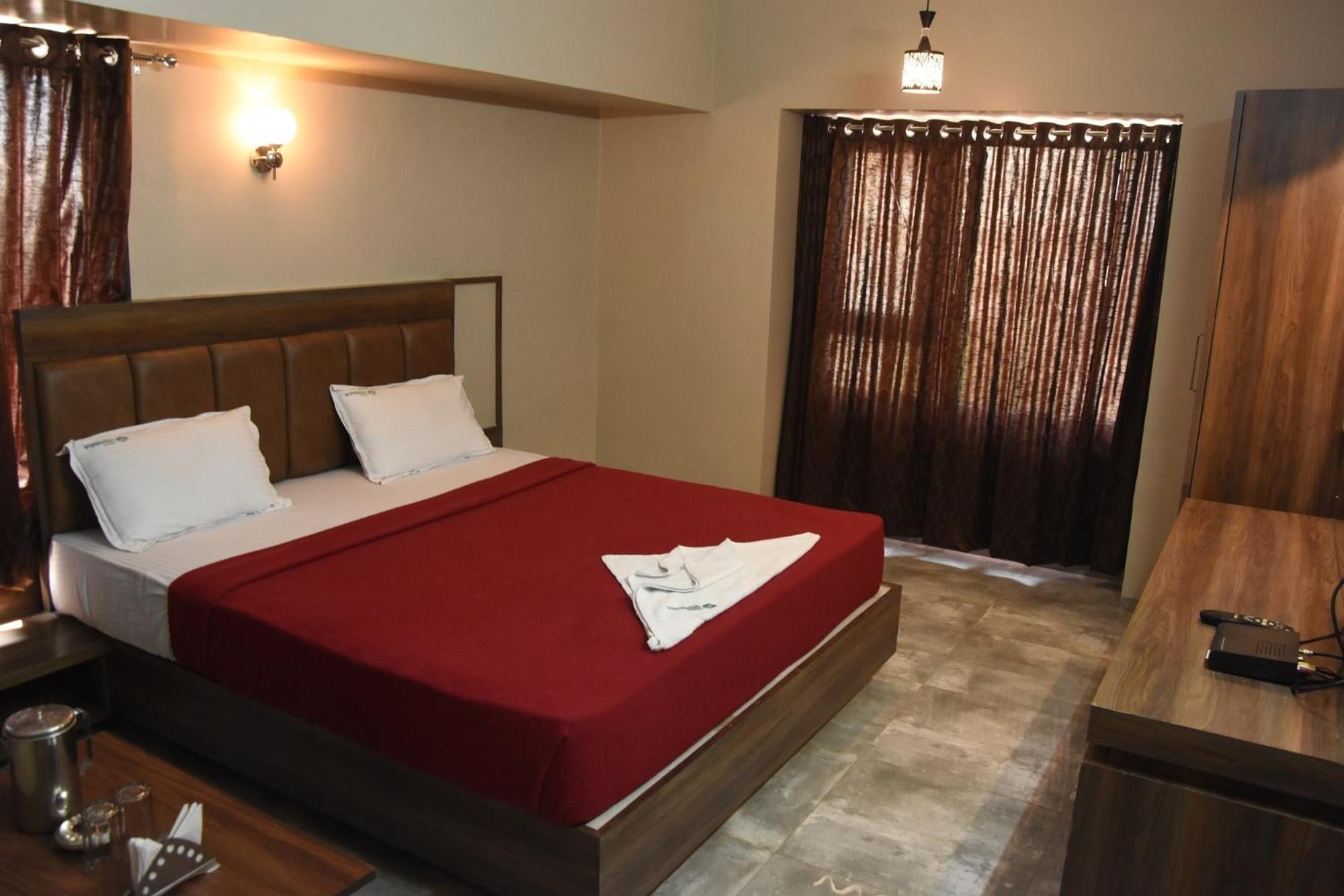 Deluxe Room - Photo 14