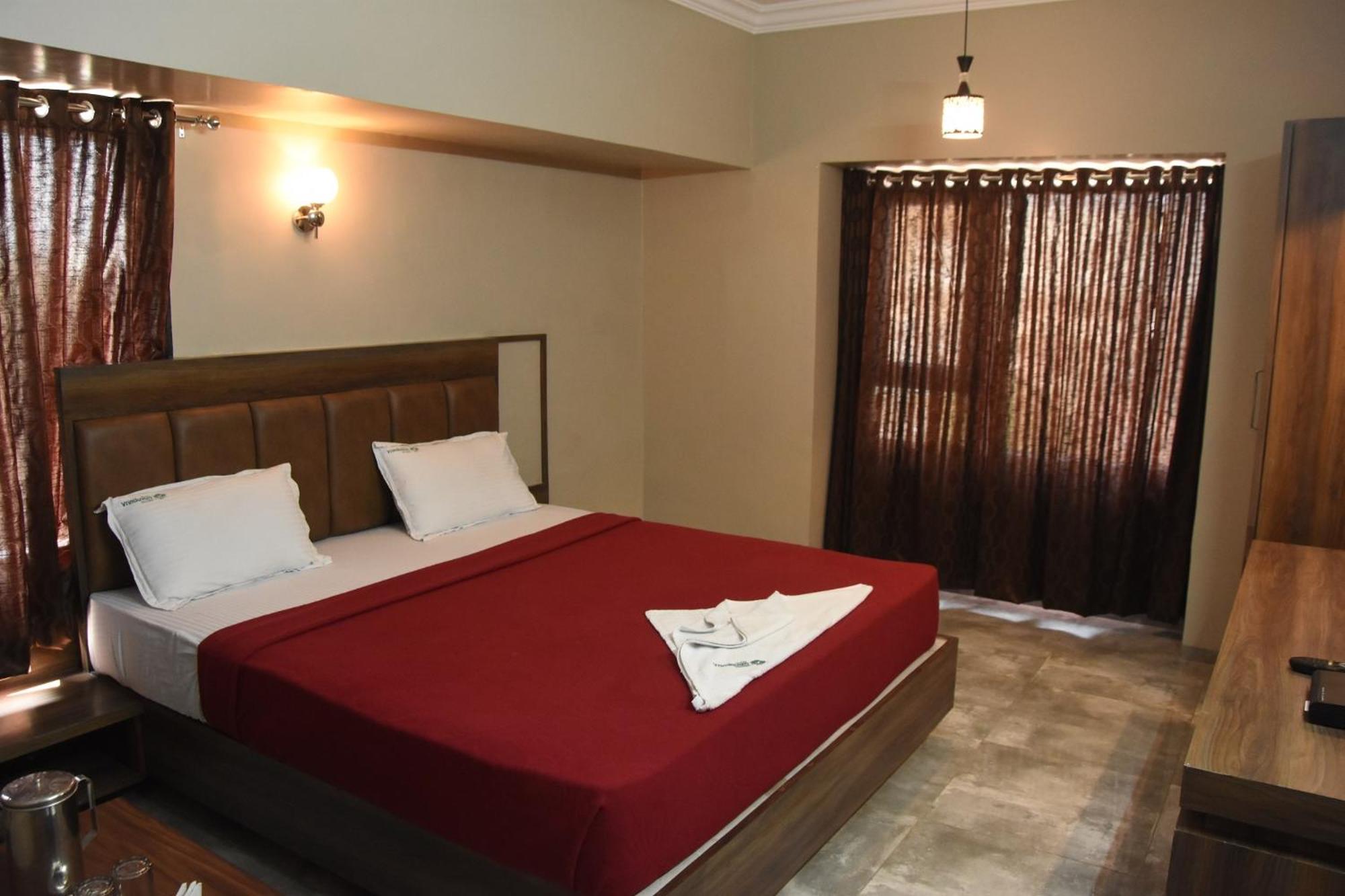 Deluxe Room - Photo 17