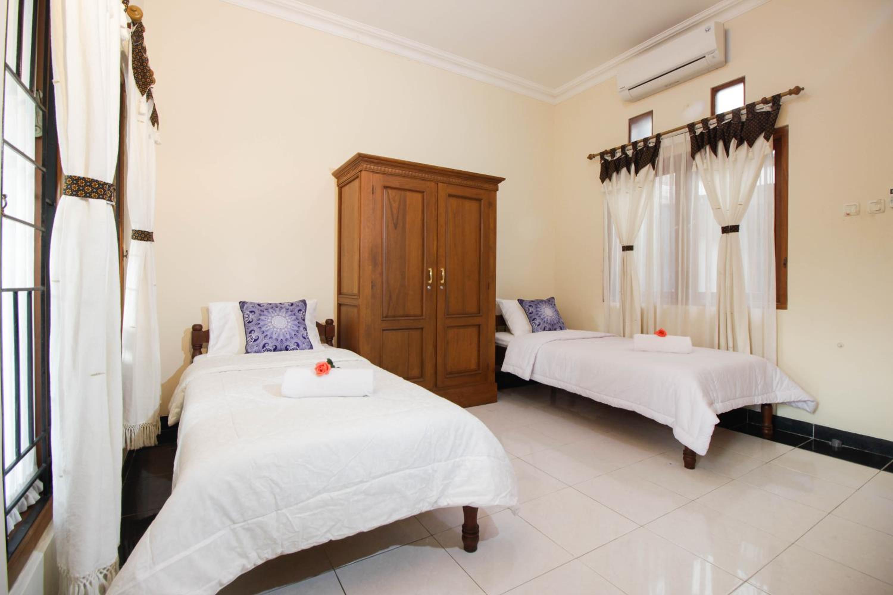 Three-Bedroom House - Photo 14