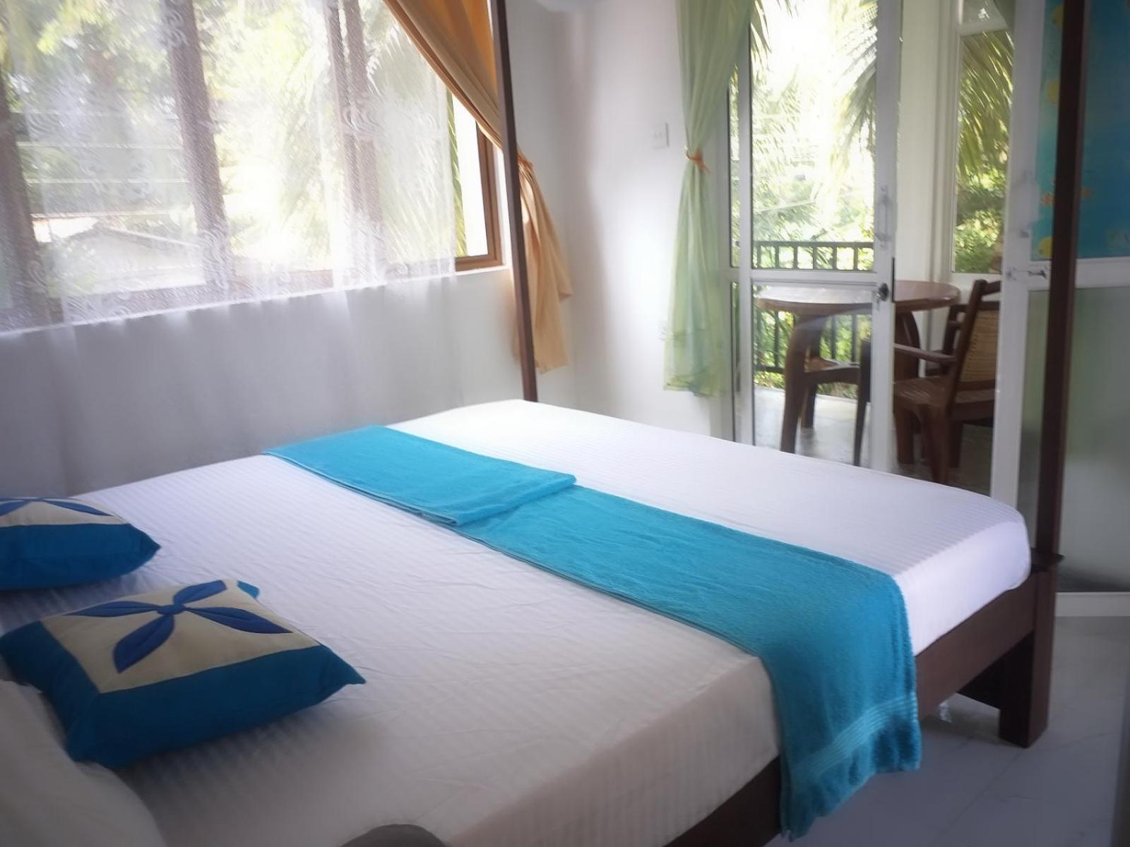 Deluxe Double Room (2 Adults + 1 Child) photo 2
