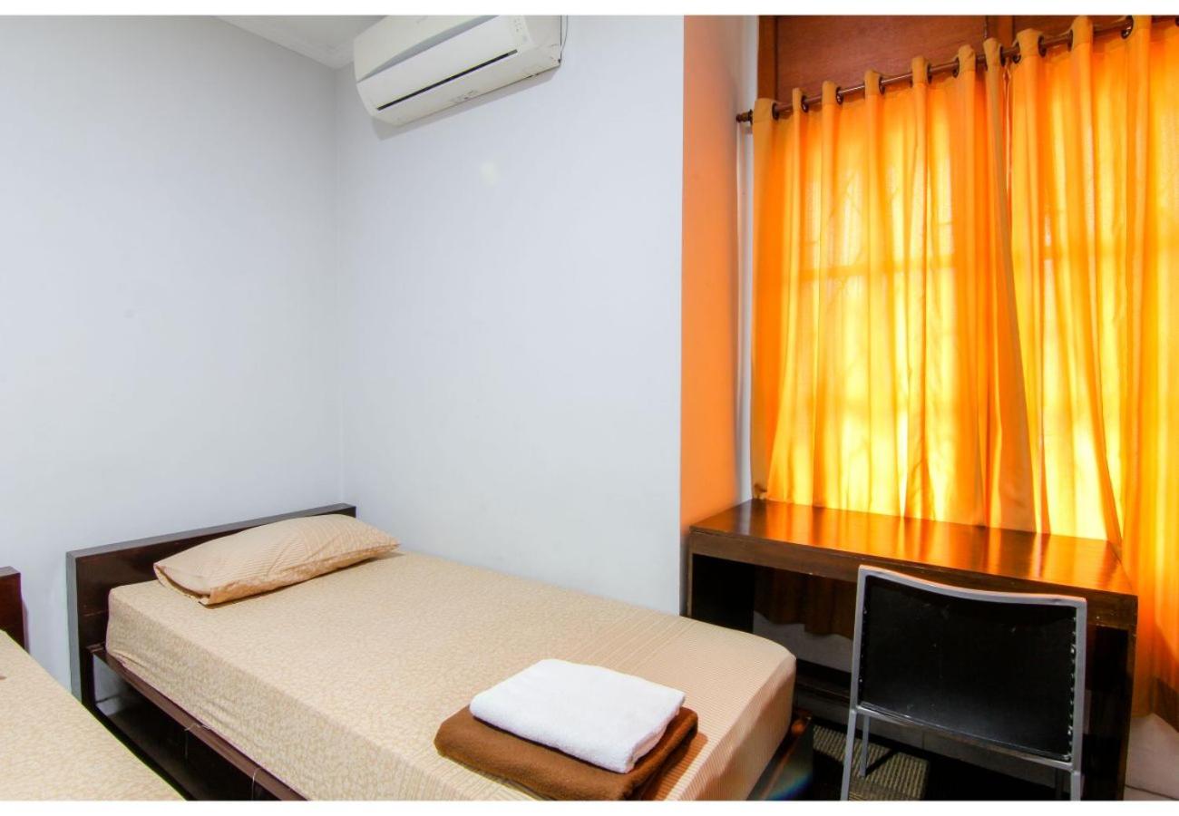 Standard Twin Room - Photo 12