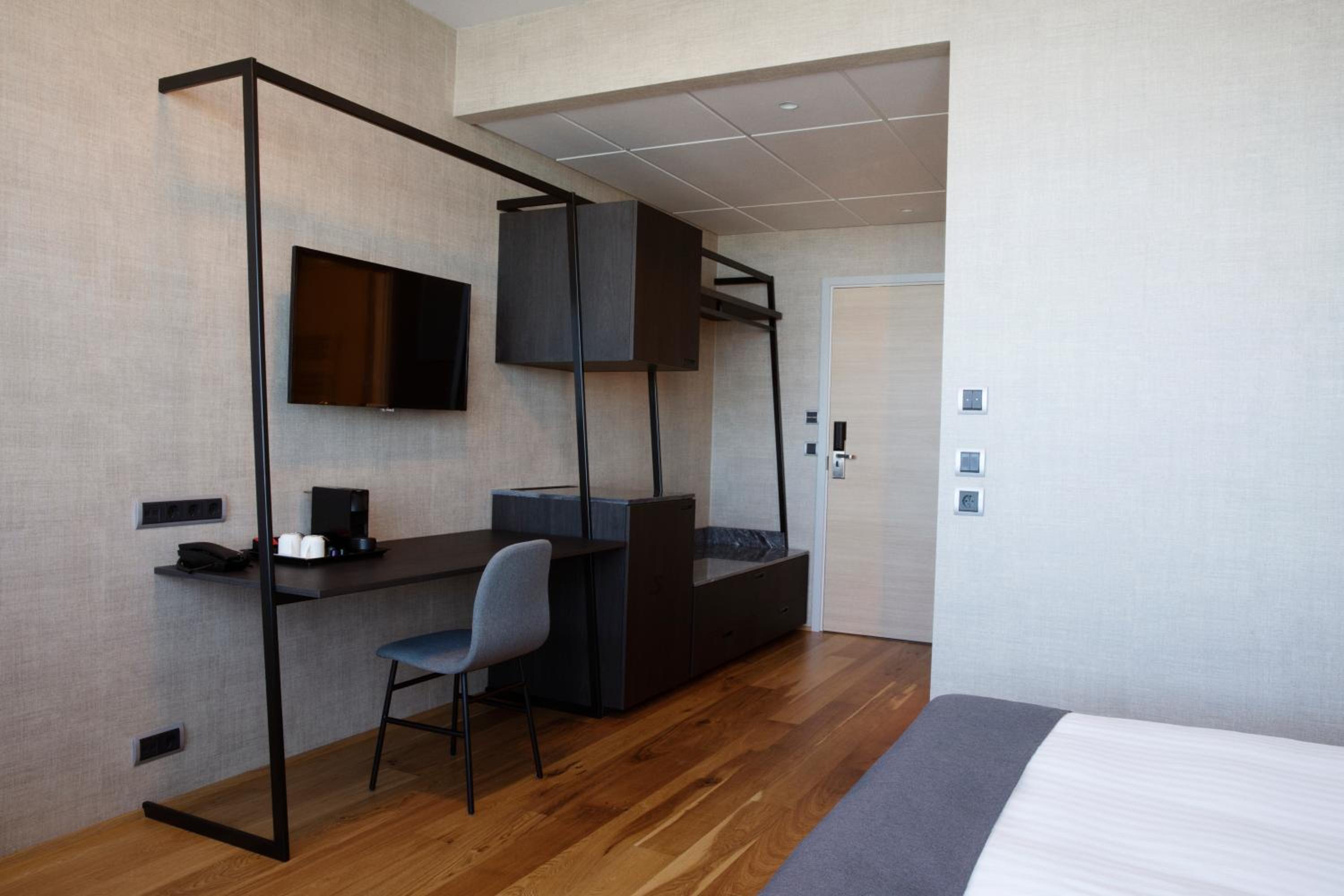 Modern comfort awaits in this stylish hotel room.