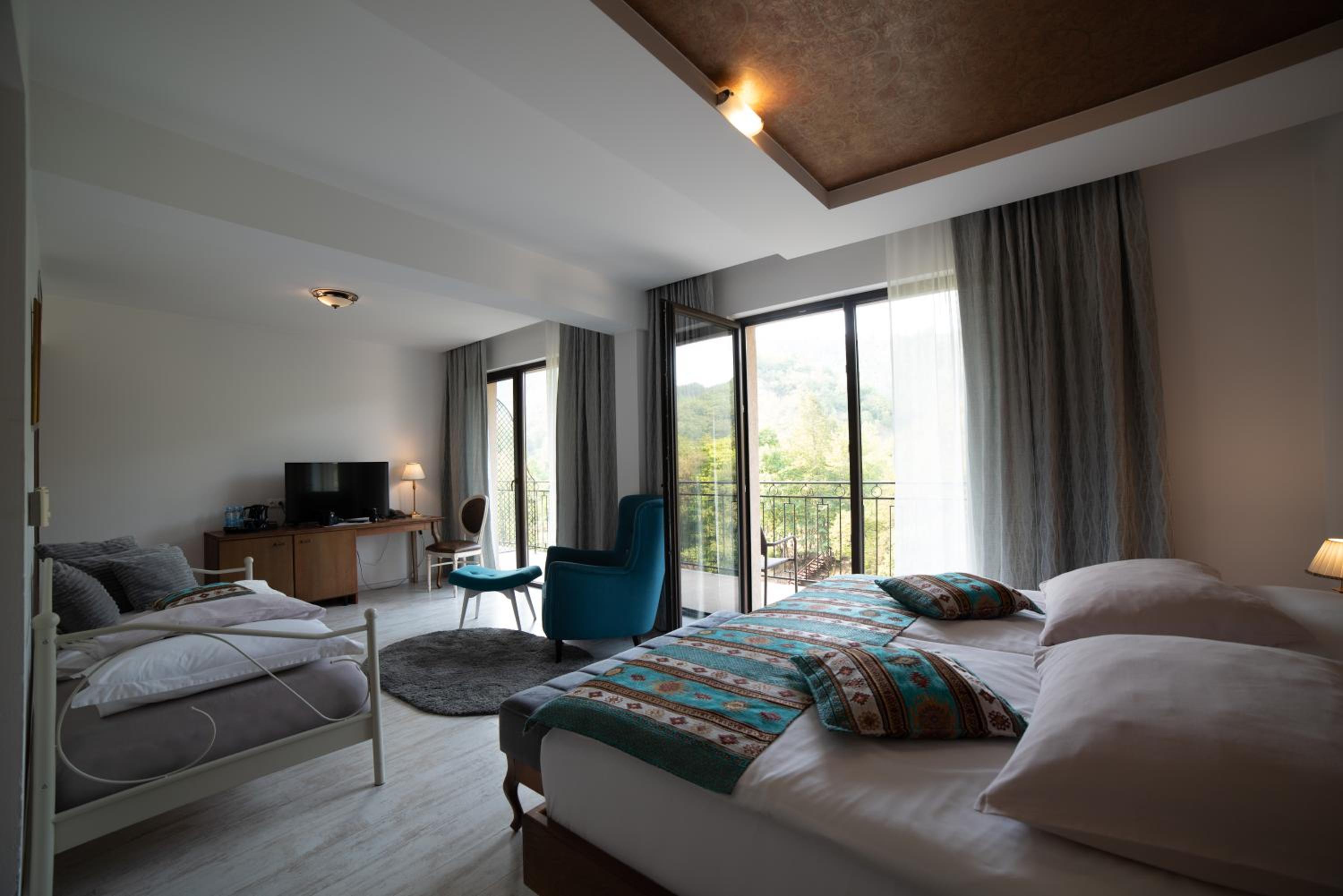 Superior Triple Room with River View and Balcony - Photo 1