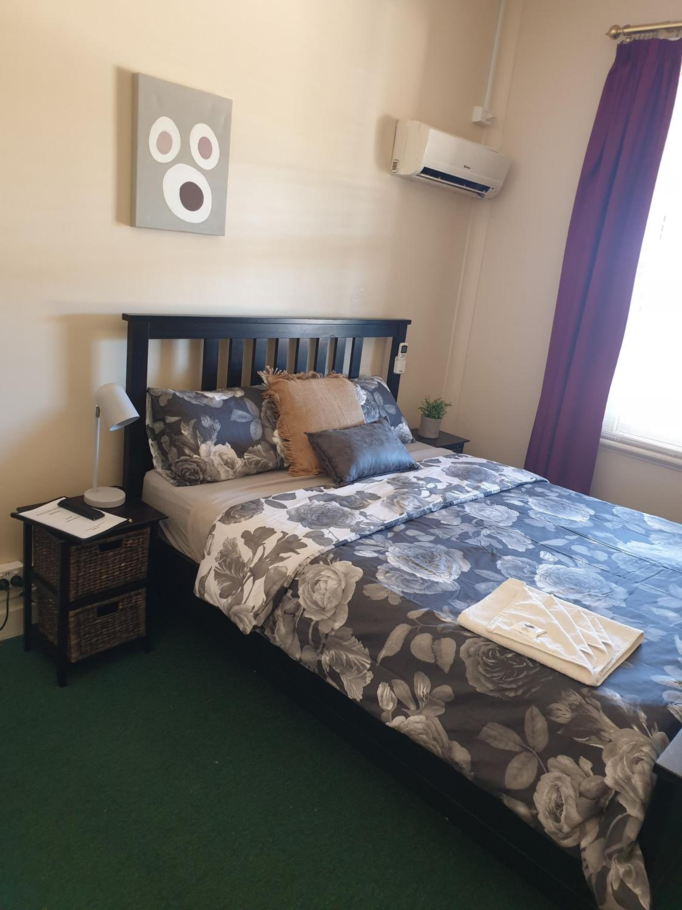 Queen Room with Shared Bathroom