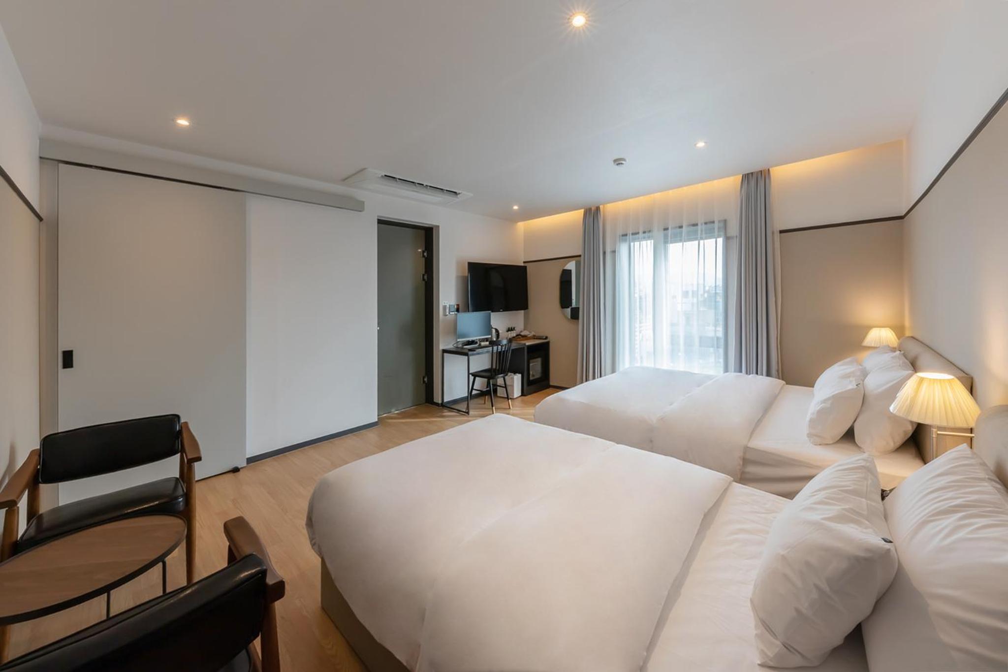 Deluxe Twin Room - Photo 7