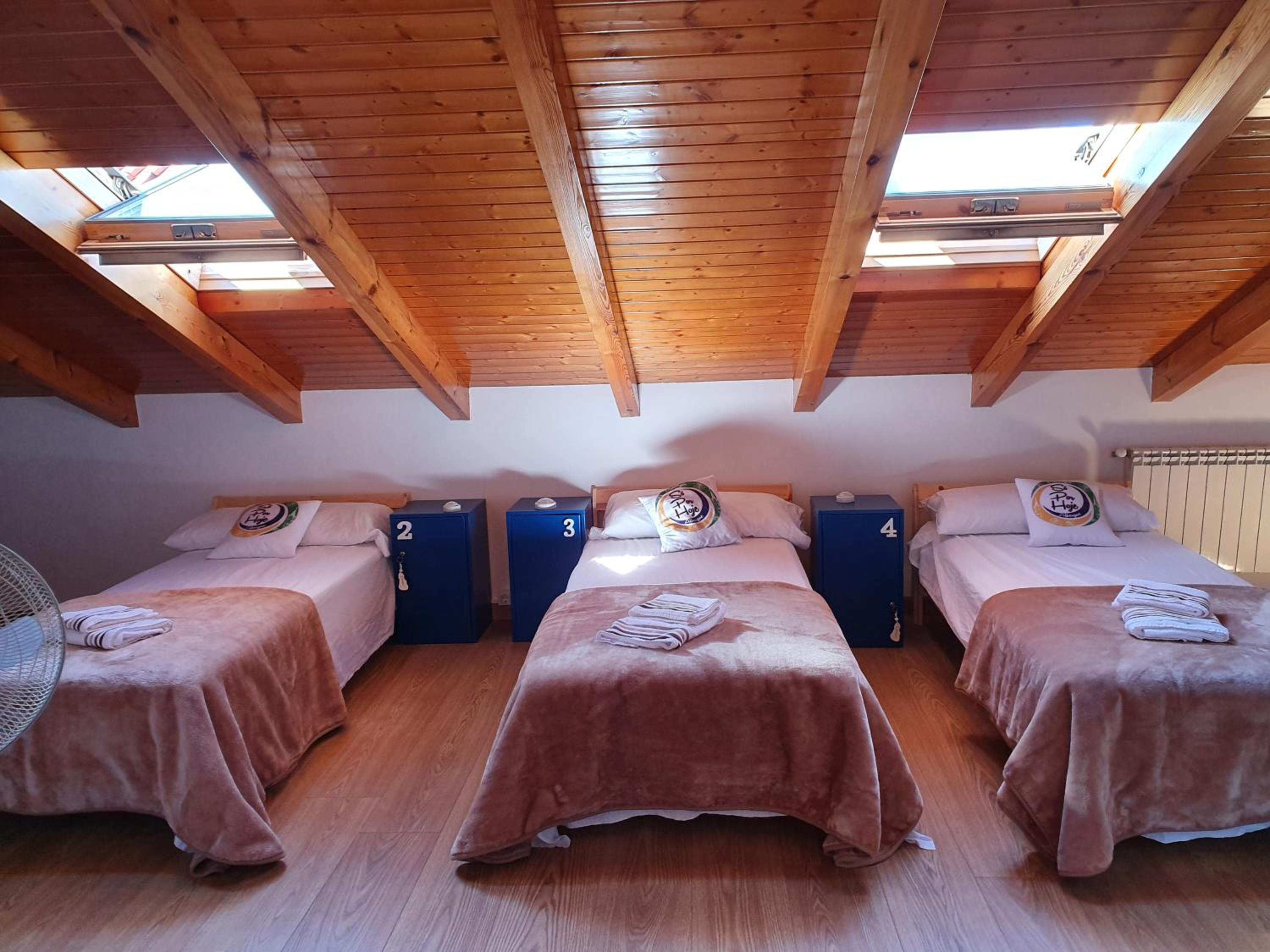 Cama individual en habitación compartida mixta