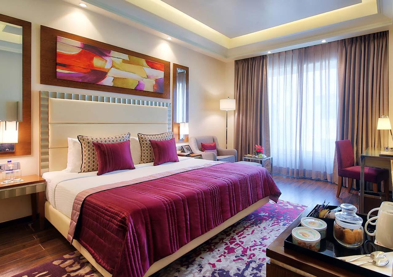 Club Queen Room - Non-Smoking with 15 % OFF ON FOOD & Soft beverages/15% off on Laundry services//1+1 happy hours at Kokkinos from 6-8 pm on IMFL drinks// INR 500 SPA discount