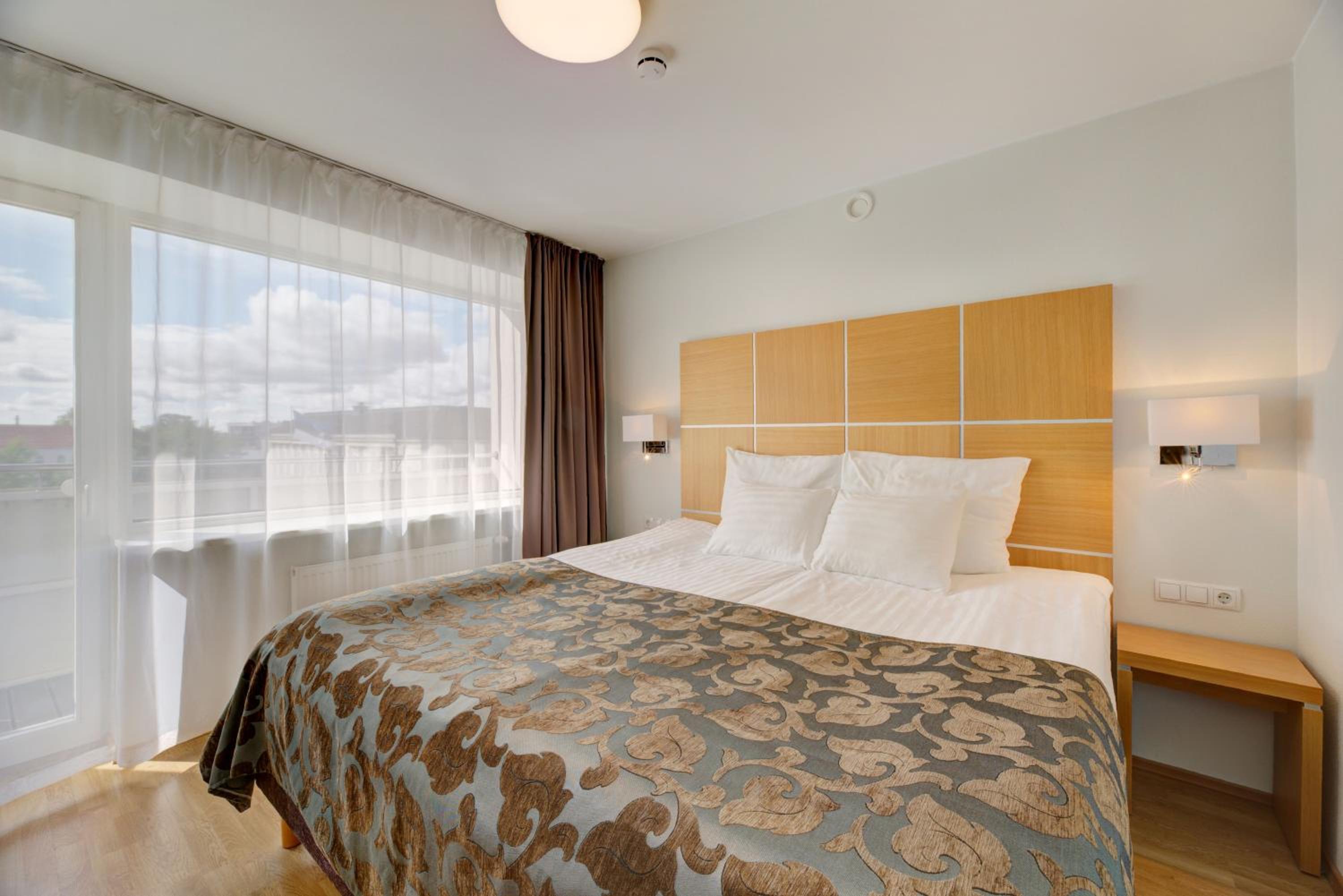 One-Bedroom Suite with Balcony and City VIew - Photo 1
