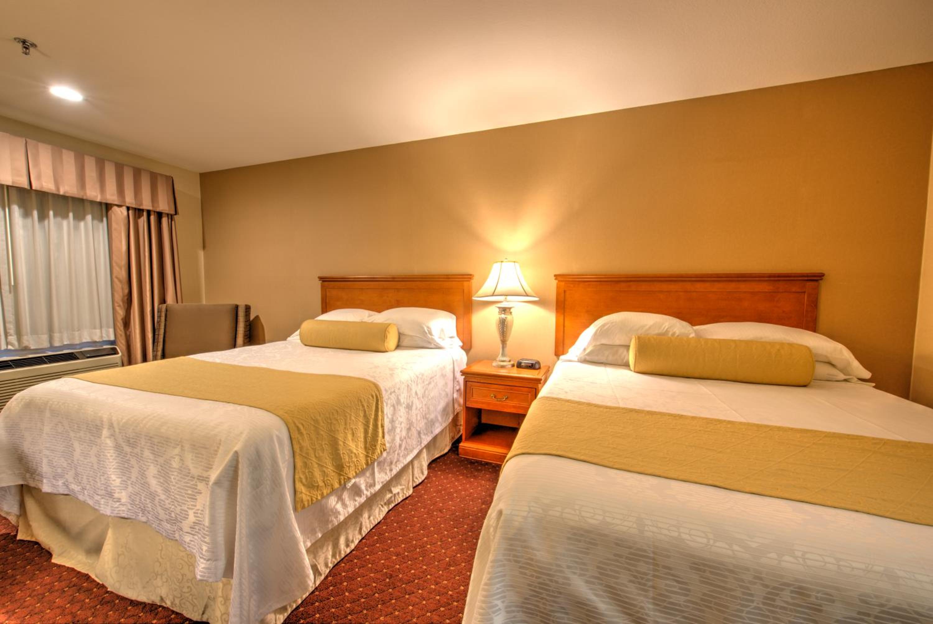 Queen Room with Two Queen Beds - Photo 1