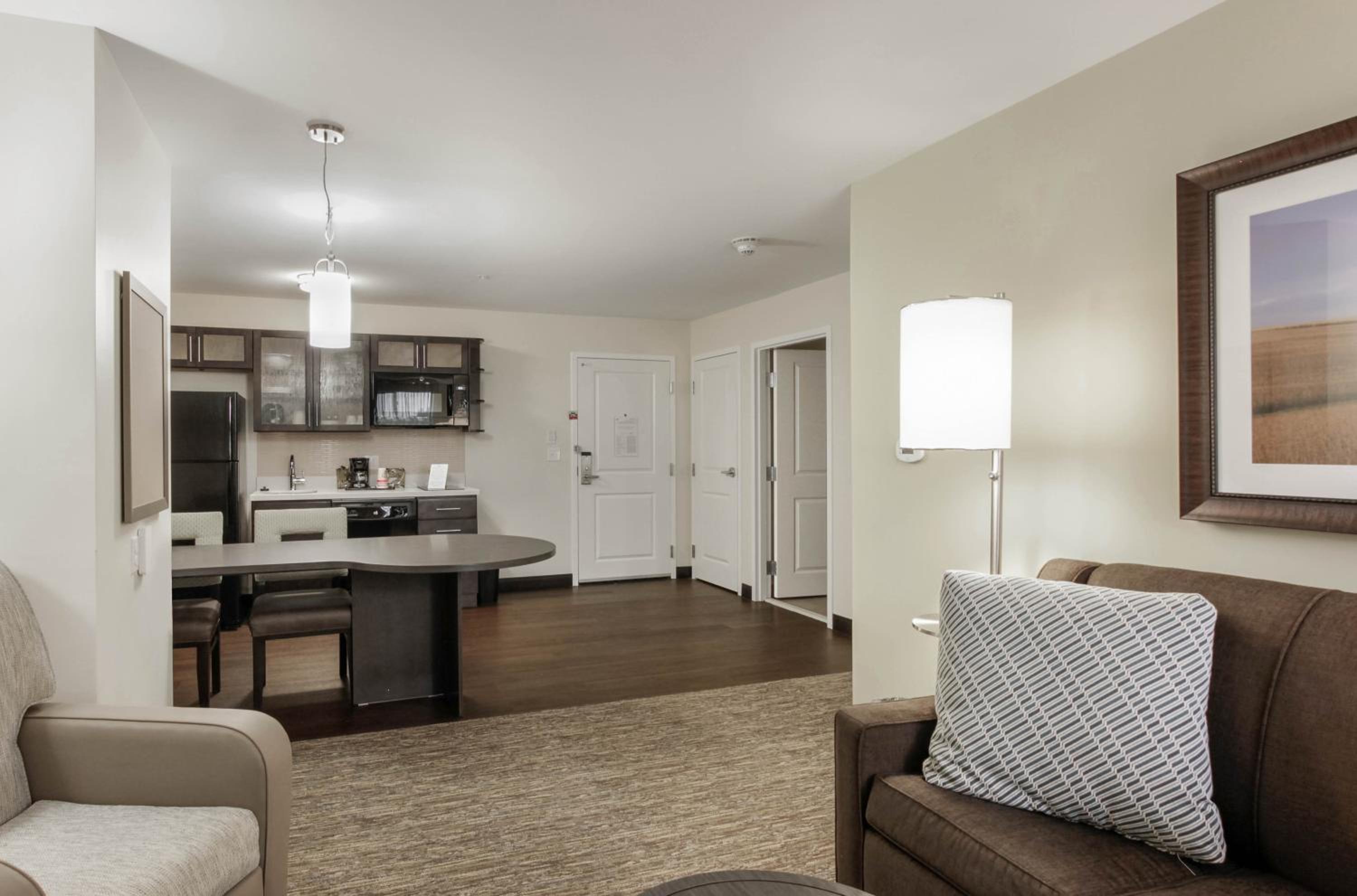 One-Bedroom Queen Suite with Dining and Sofa Bed - Photo 1