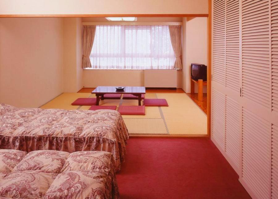Standard Twin Room - Photo 4