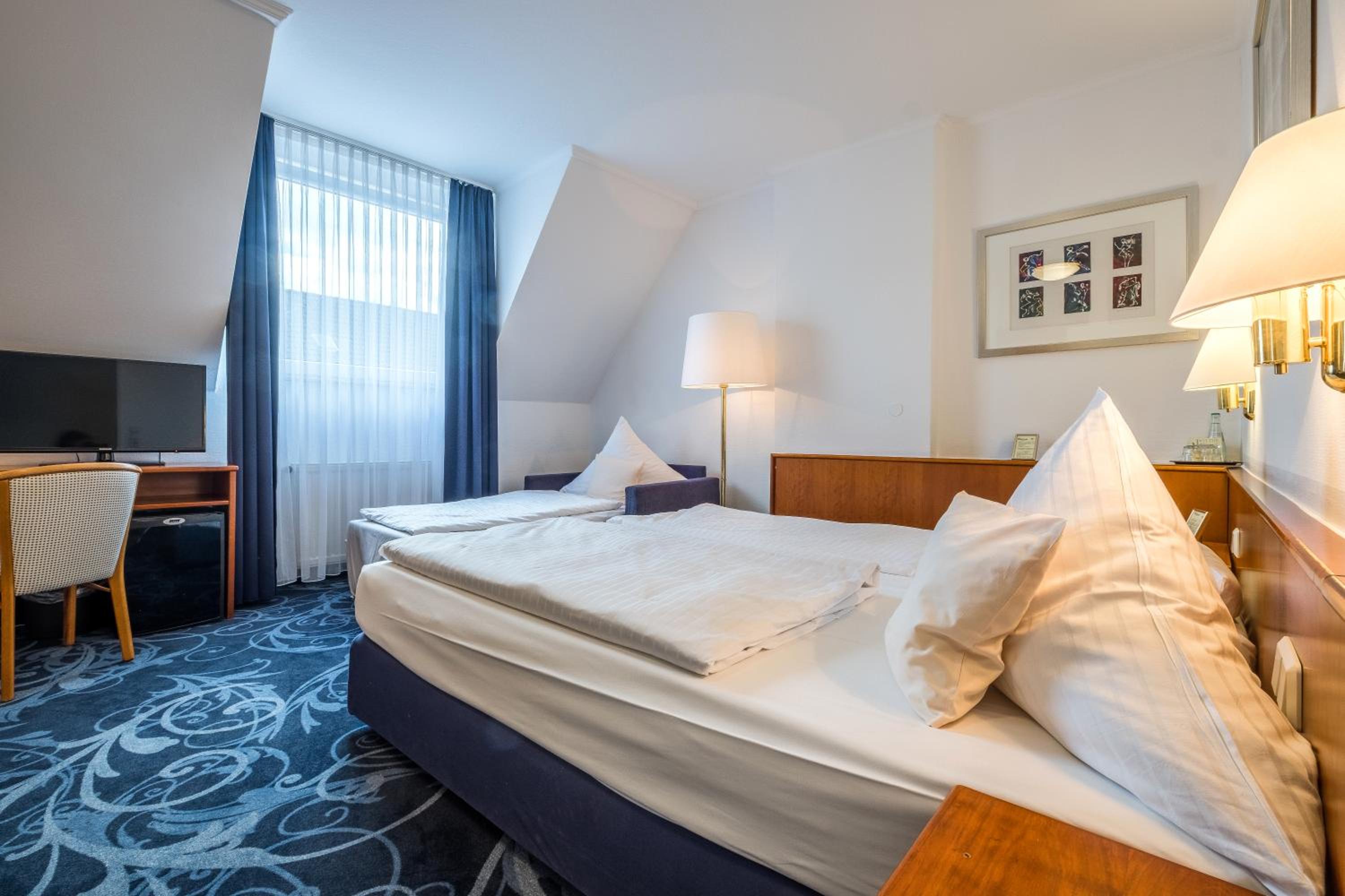 Triple Room - Photo 1