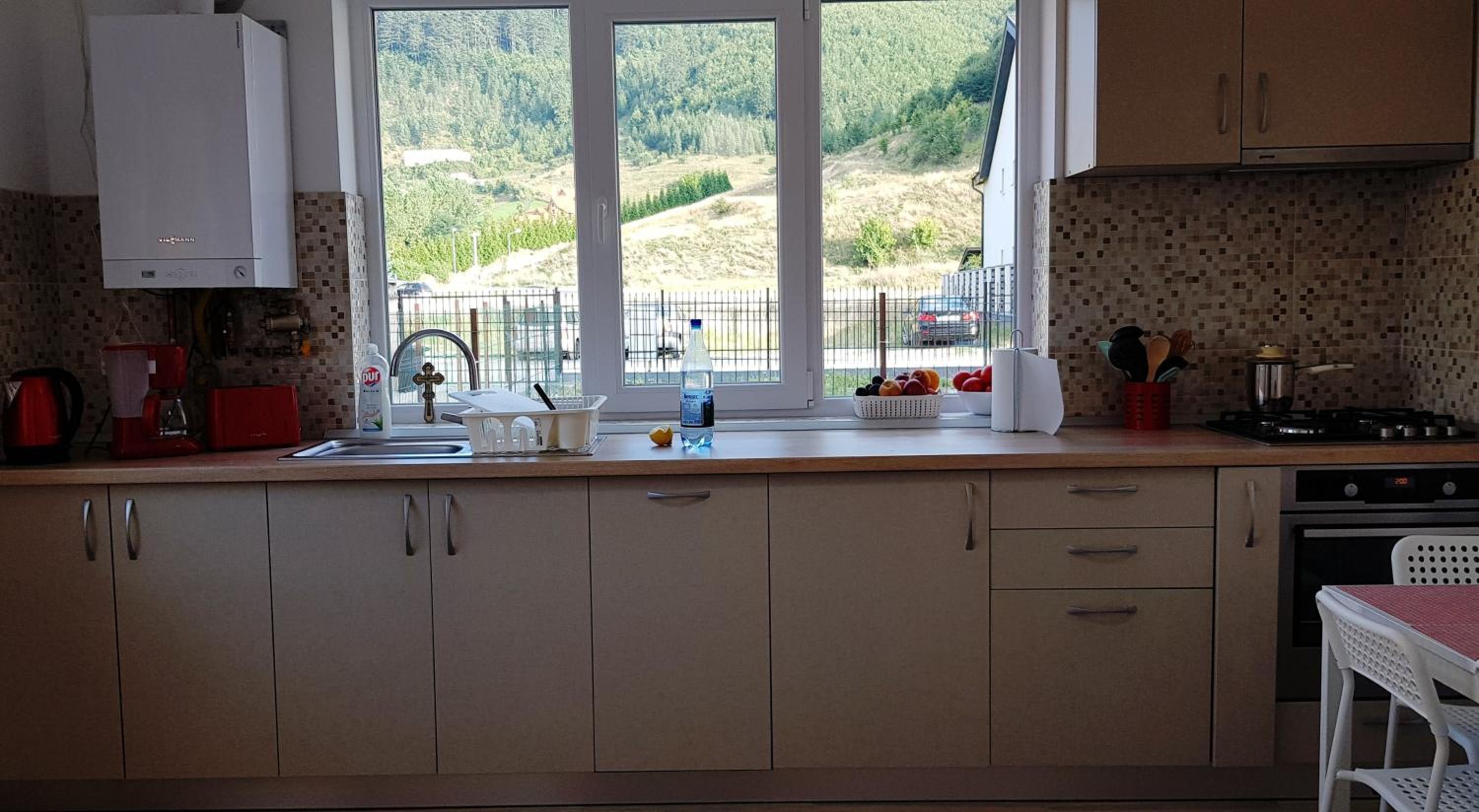 Three-Bedroom House - Photo 28