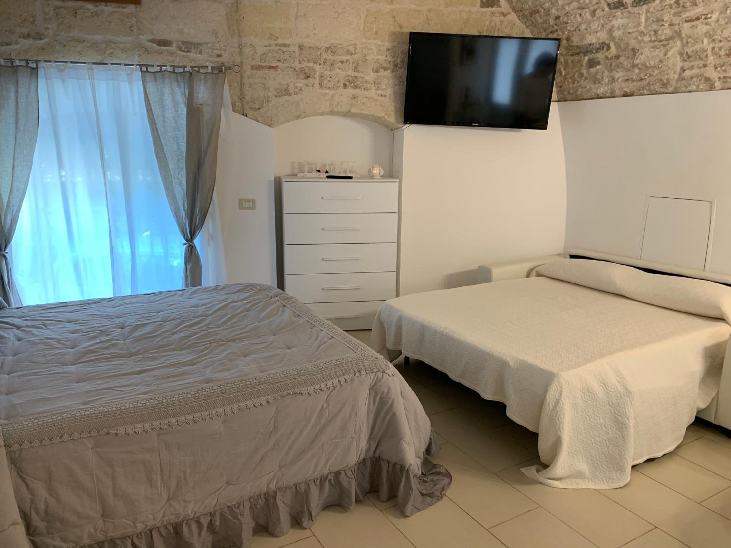 Quadruple Room with Garden View - Photo 16