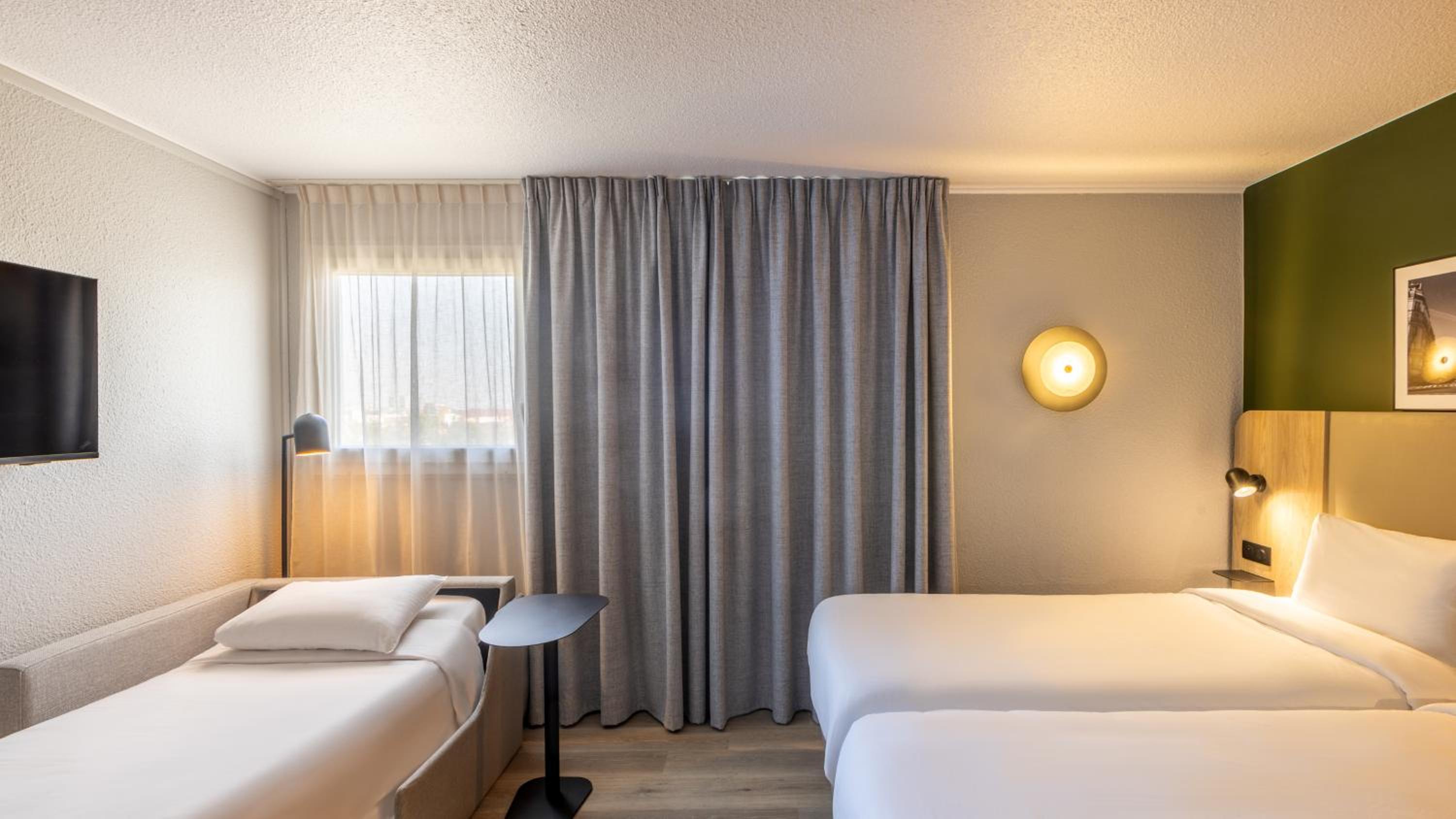 Standard Twin Room with Two Single Beds and Sofa Bed