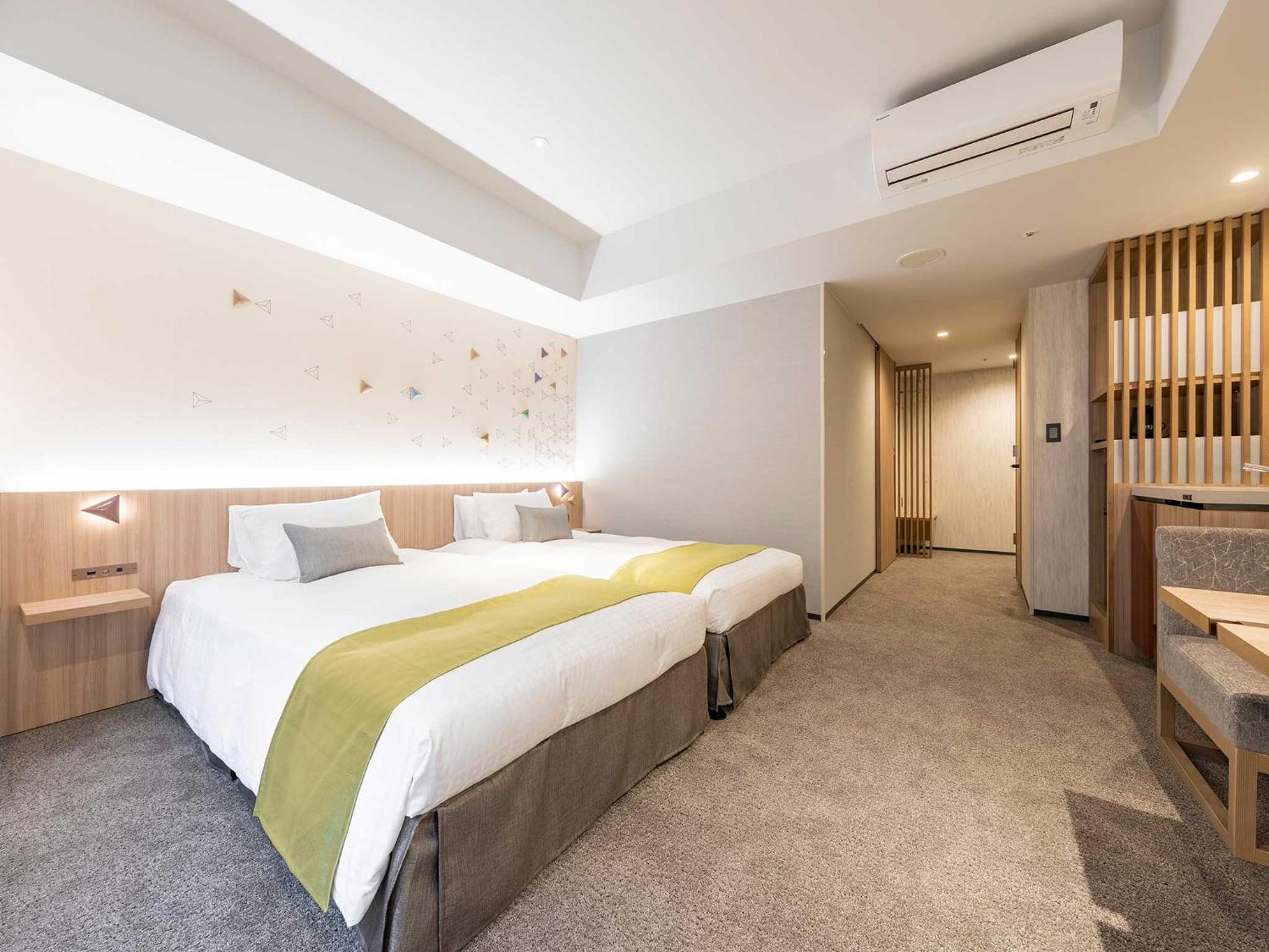 Deluxe Twin Room - Photo 16