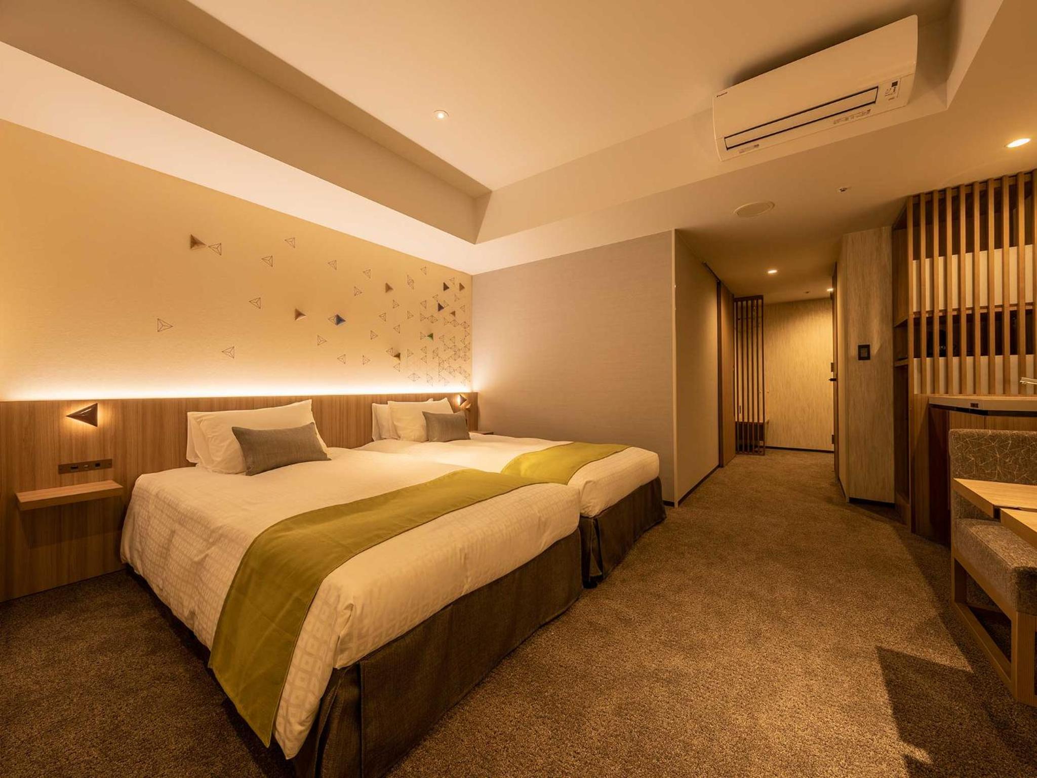 Deluxe Twin Room - Photo 17