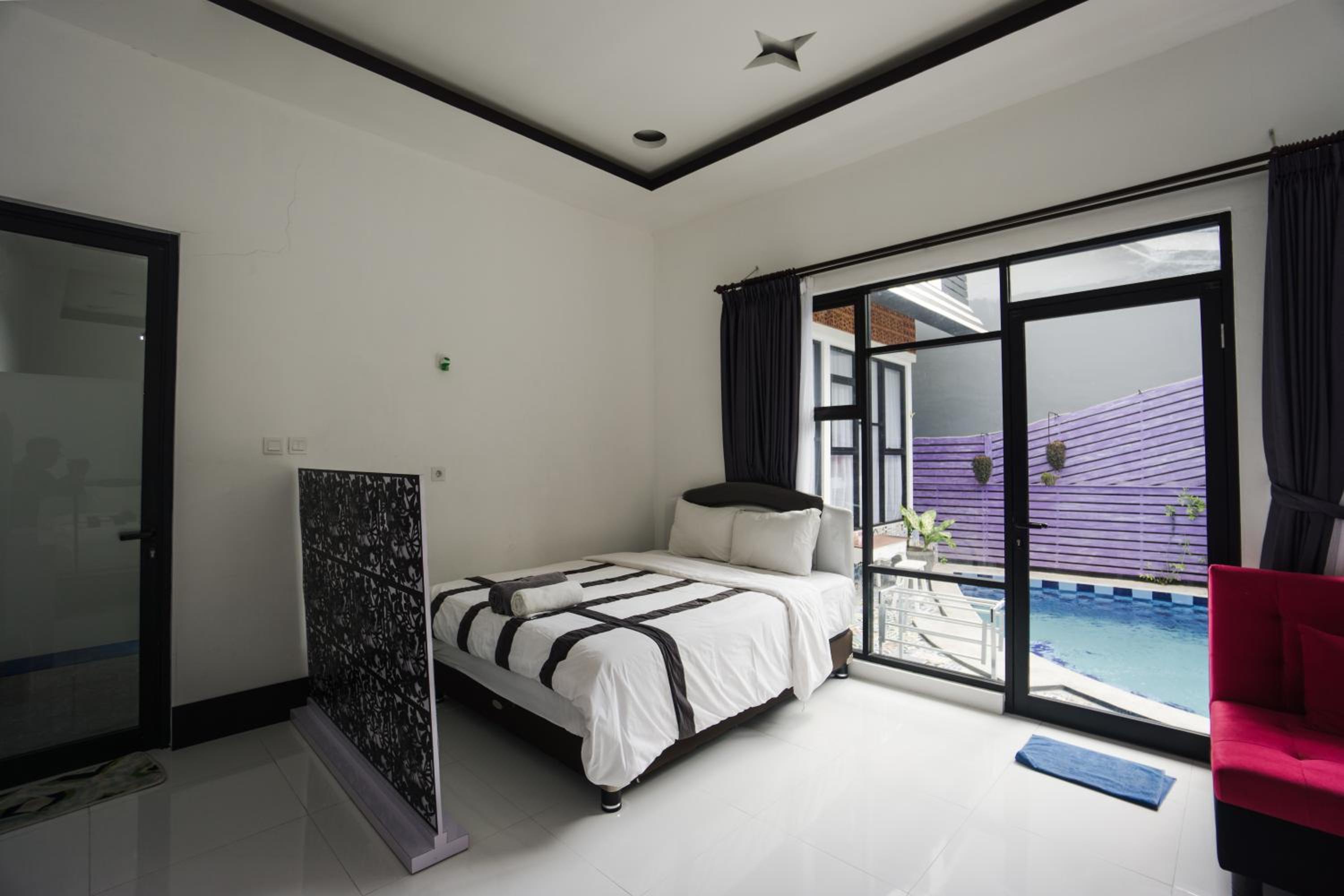 Deluxe Quadruple Room - Photo 8