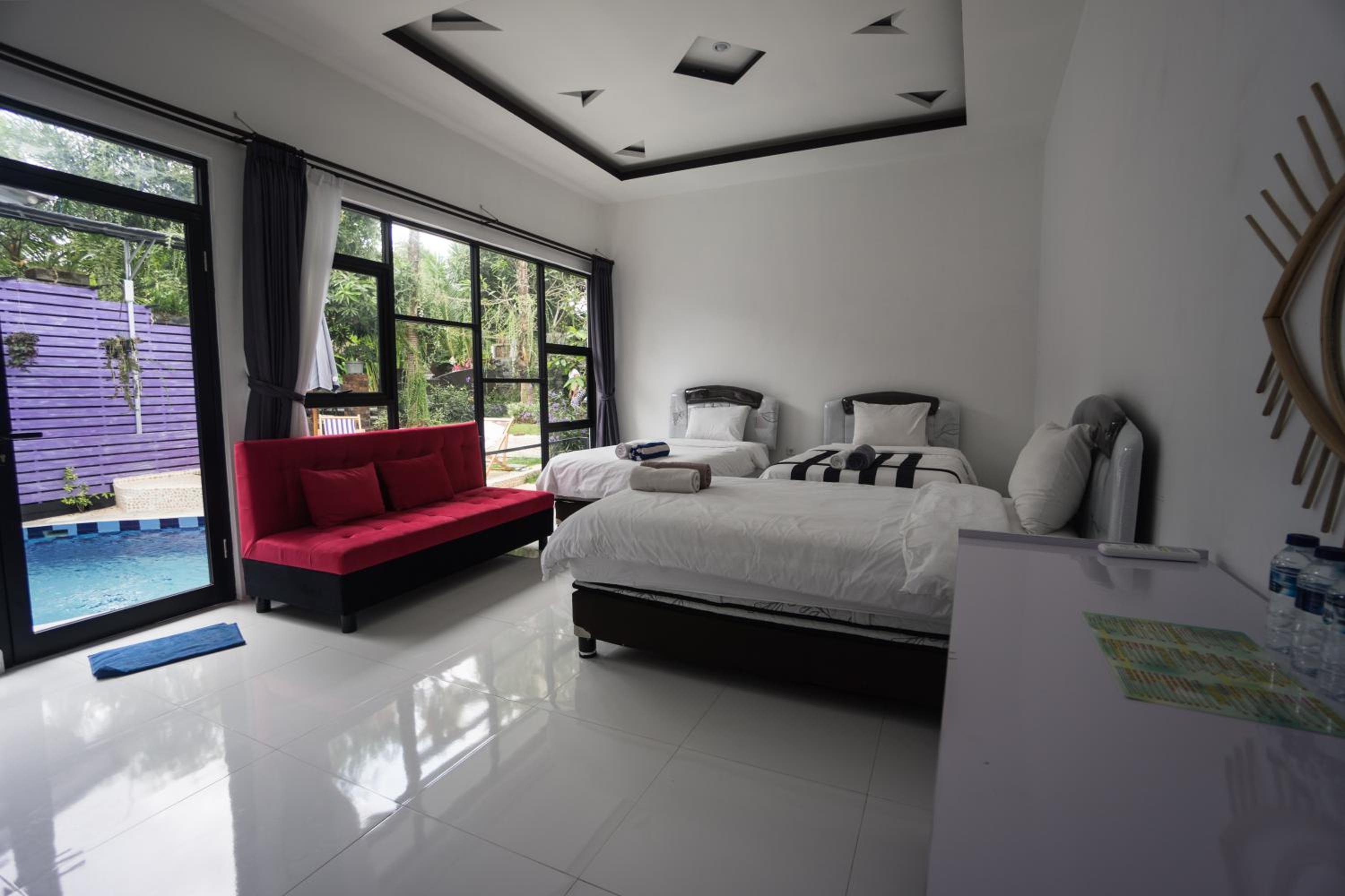 Deluxe Quadruple Room - Photo 9