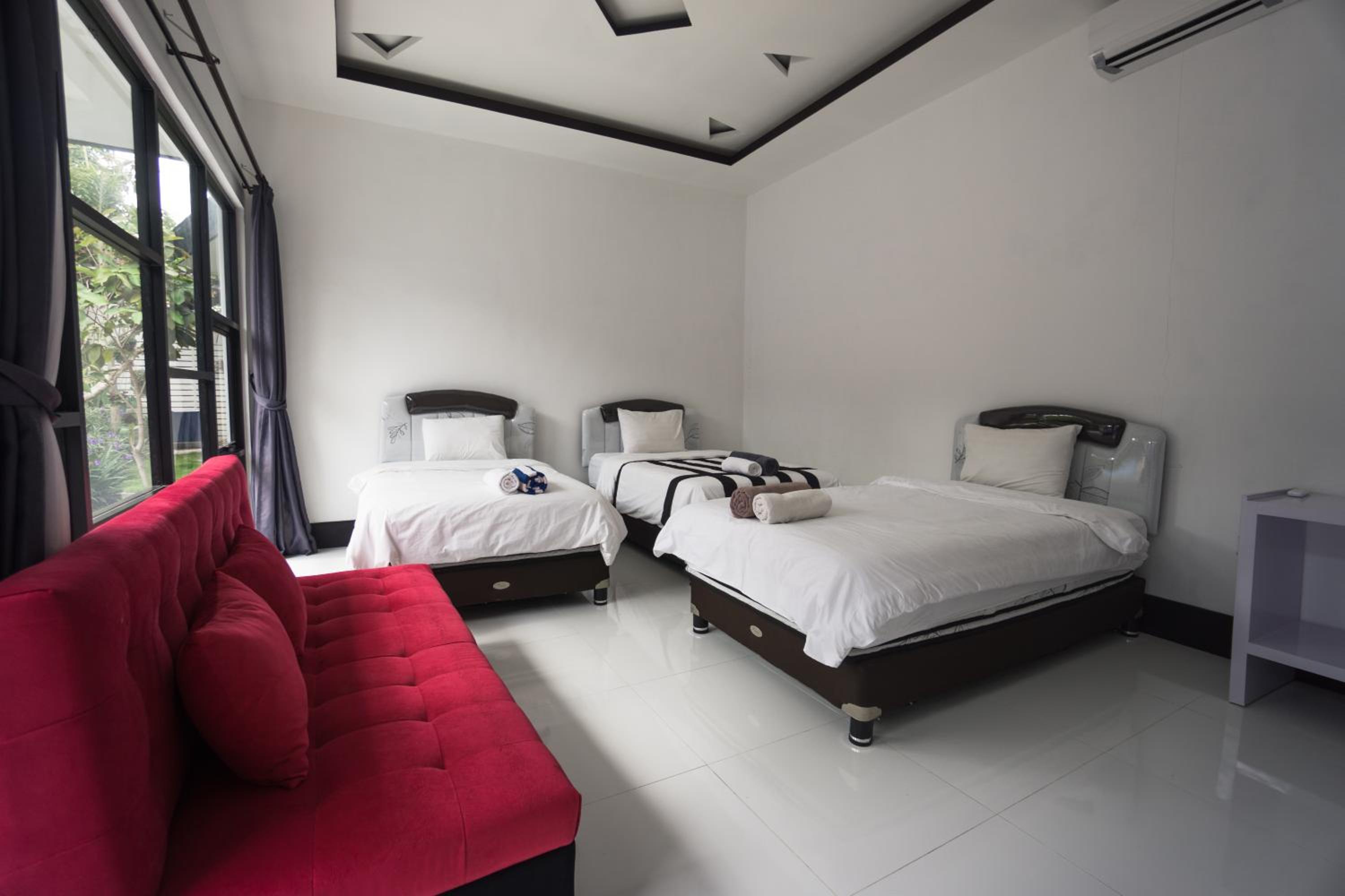 Deluxe Quadruple Room - Photo 10