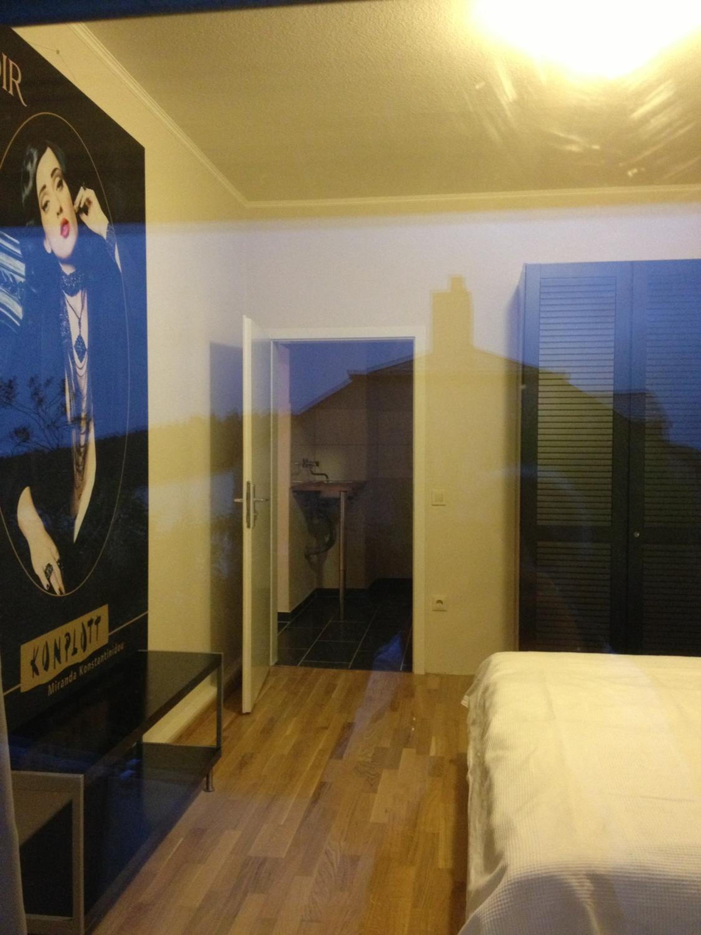 Family Room with Balcony - Photo 1